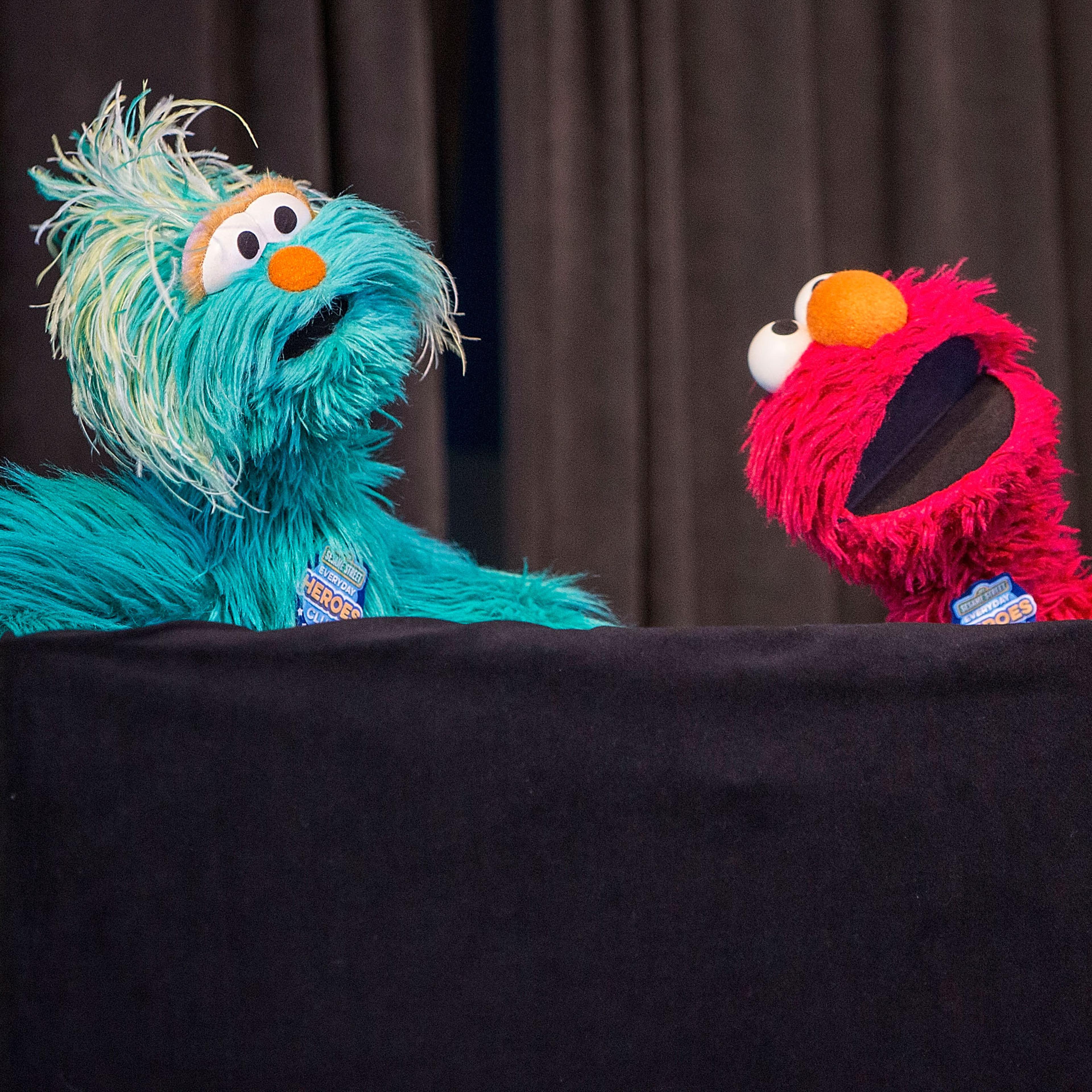 Sesame Street characters Rosita (L) and Elmo perform on stage at Sesame Street and HBO Host Free Museum Day with a special performance by Elmo and Friends at The New Children's Museum on January 9, 2016 in San Diego, California.