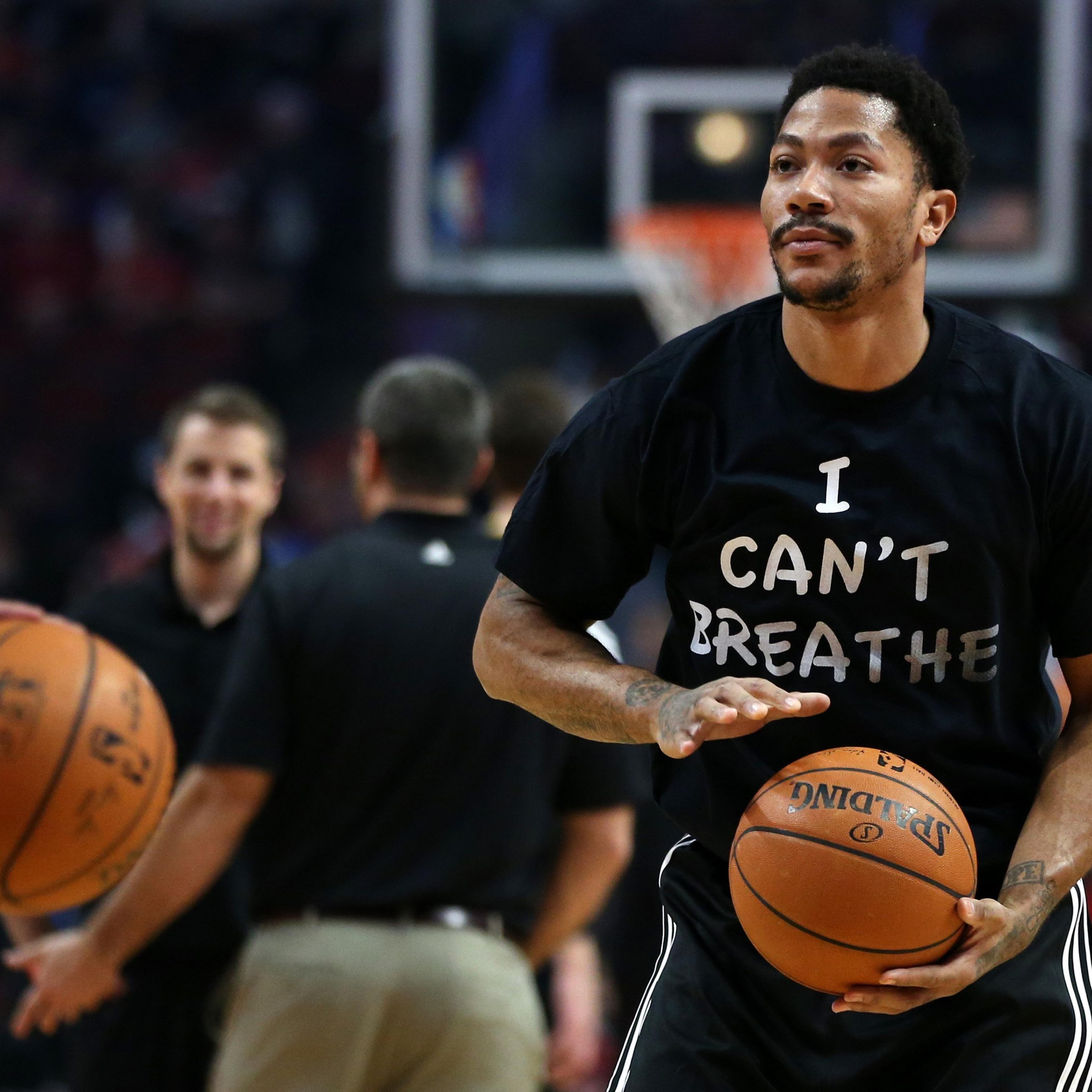 Chicago Bulls guard Derrick Rose wears a shirt reading "I Can't Breath" while warming up for a game against the Golden State Warriors on Dec. 6, 2014 at the United Center in Chicago.