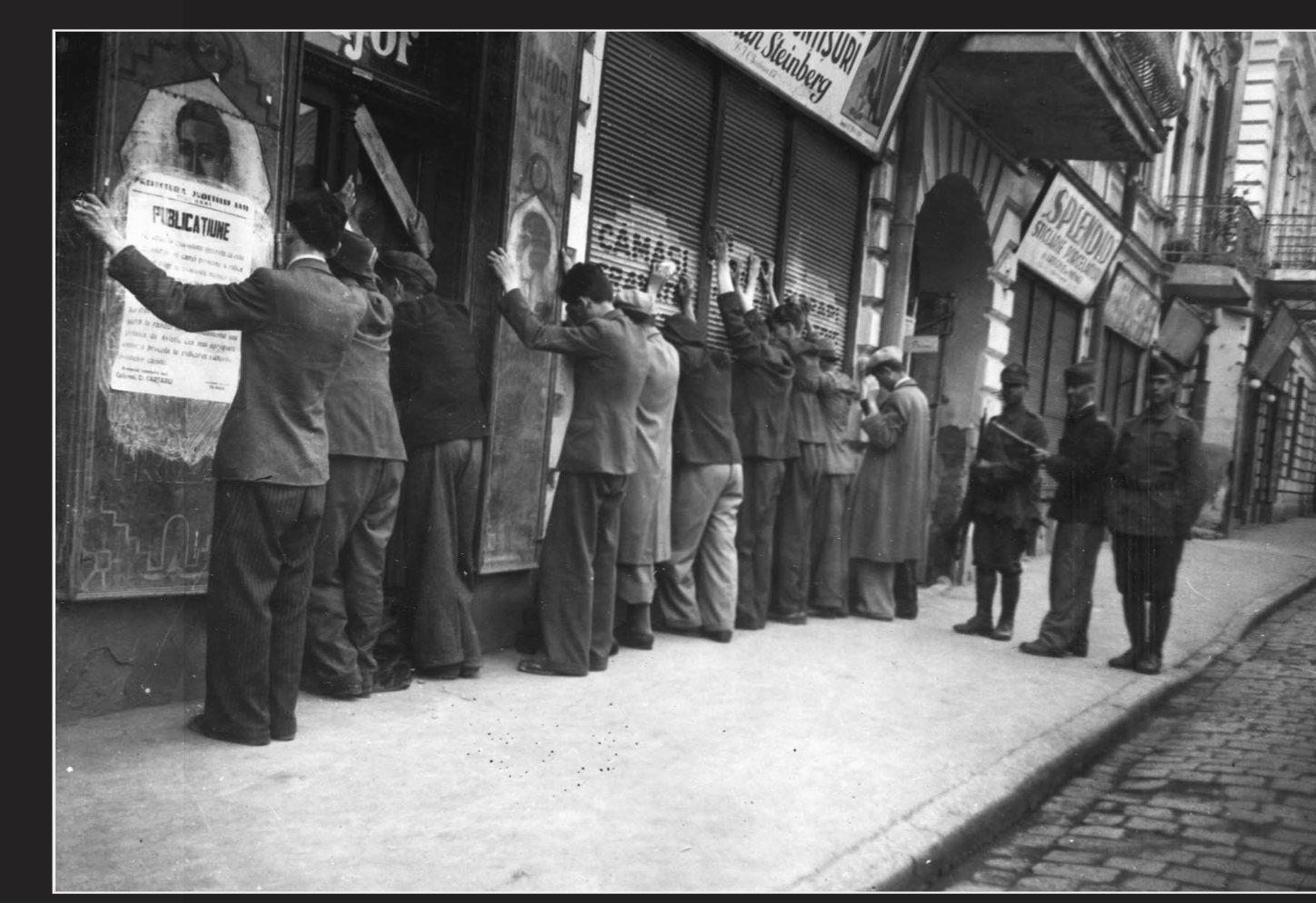 Iasi - Arrested Jews being escorted to police headquarters with their hands in the air