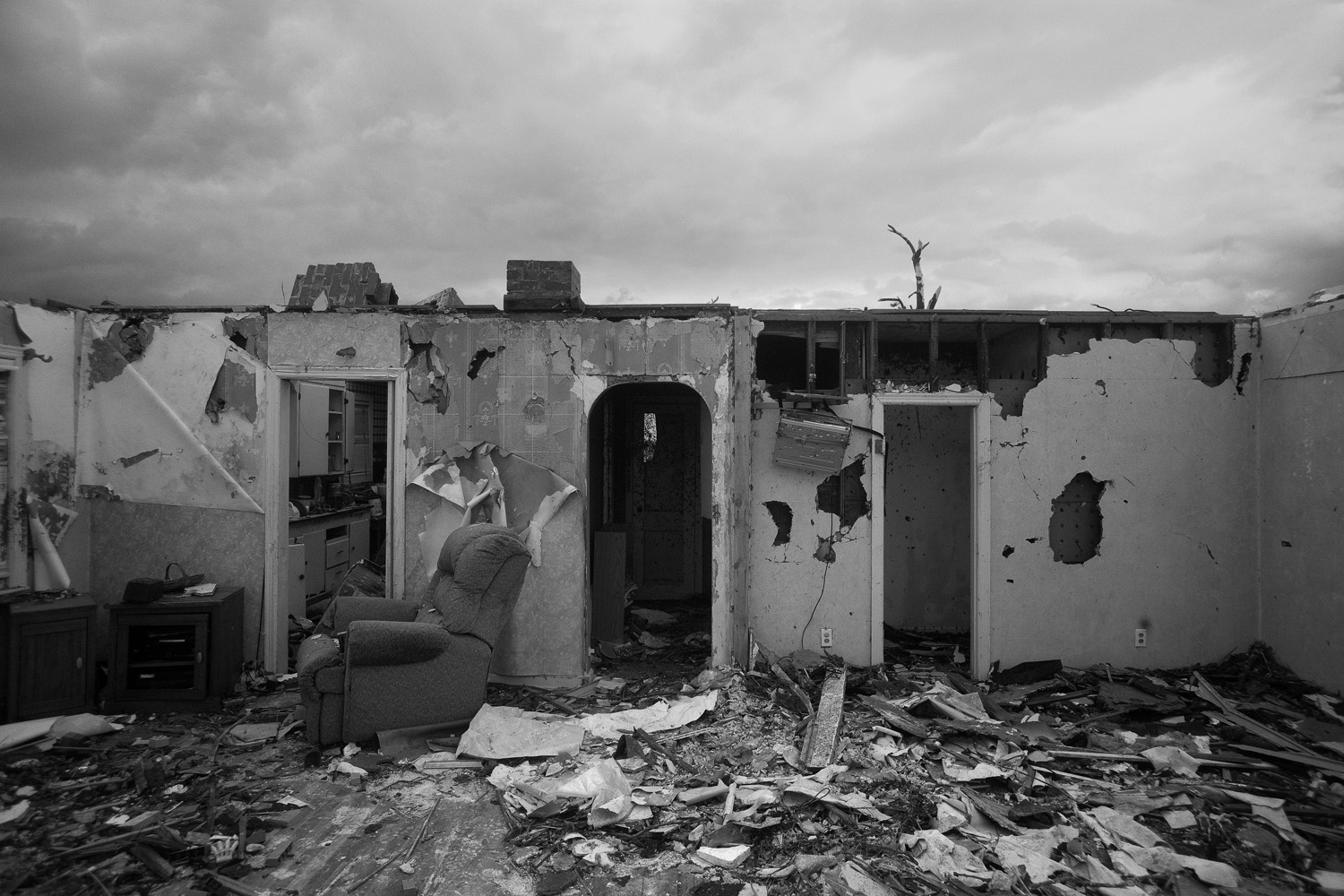 Homes were ripped apart and more than 100 people were killed in minutes by the EF-5 twister. Joplin, Mo. May 26, 2011