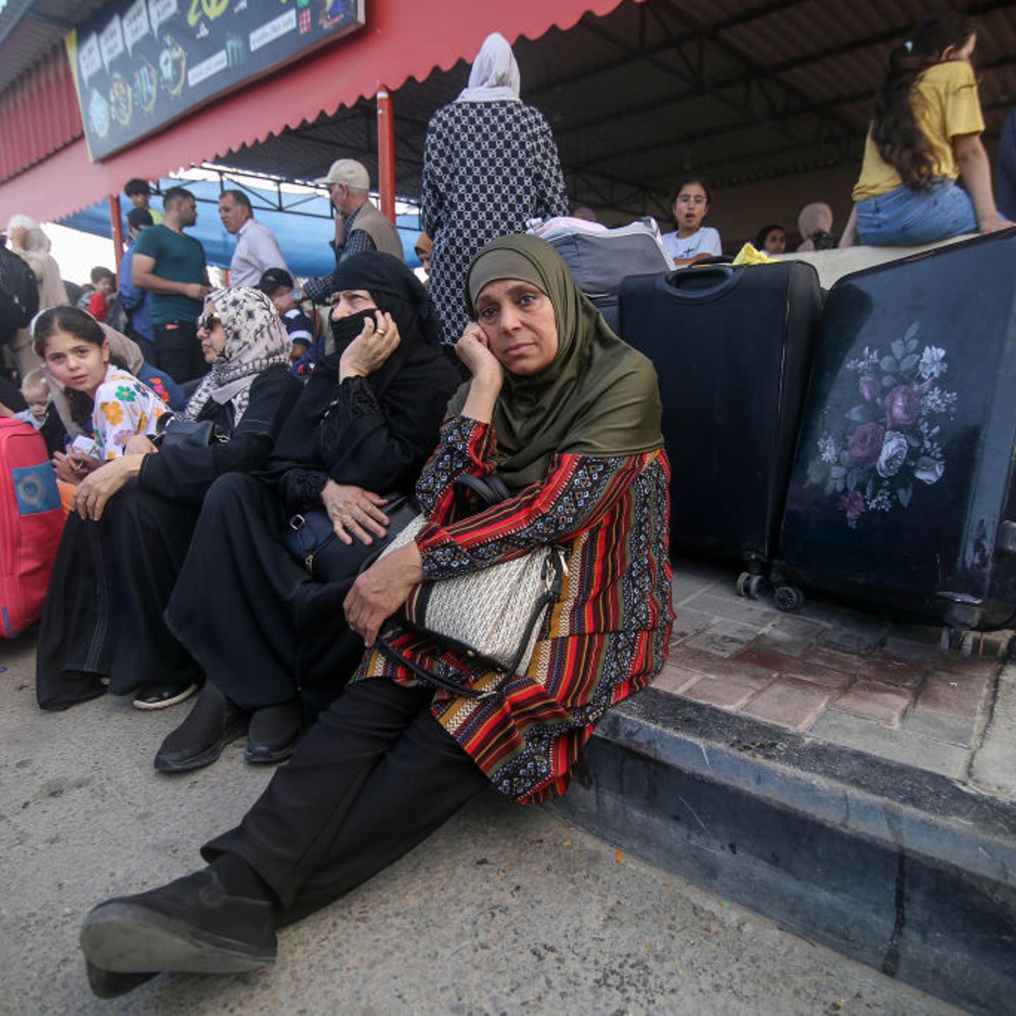 Palestinians waiting to cross the Rafah Border Gate