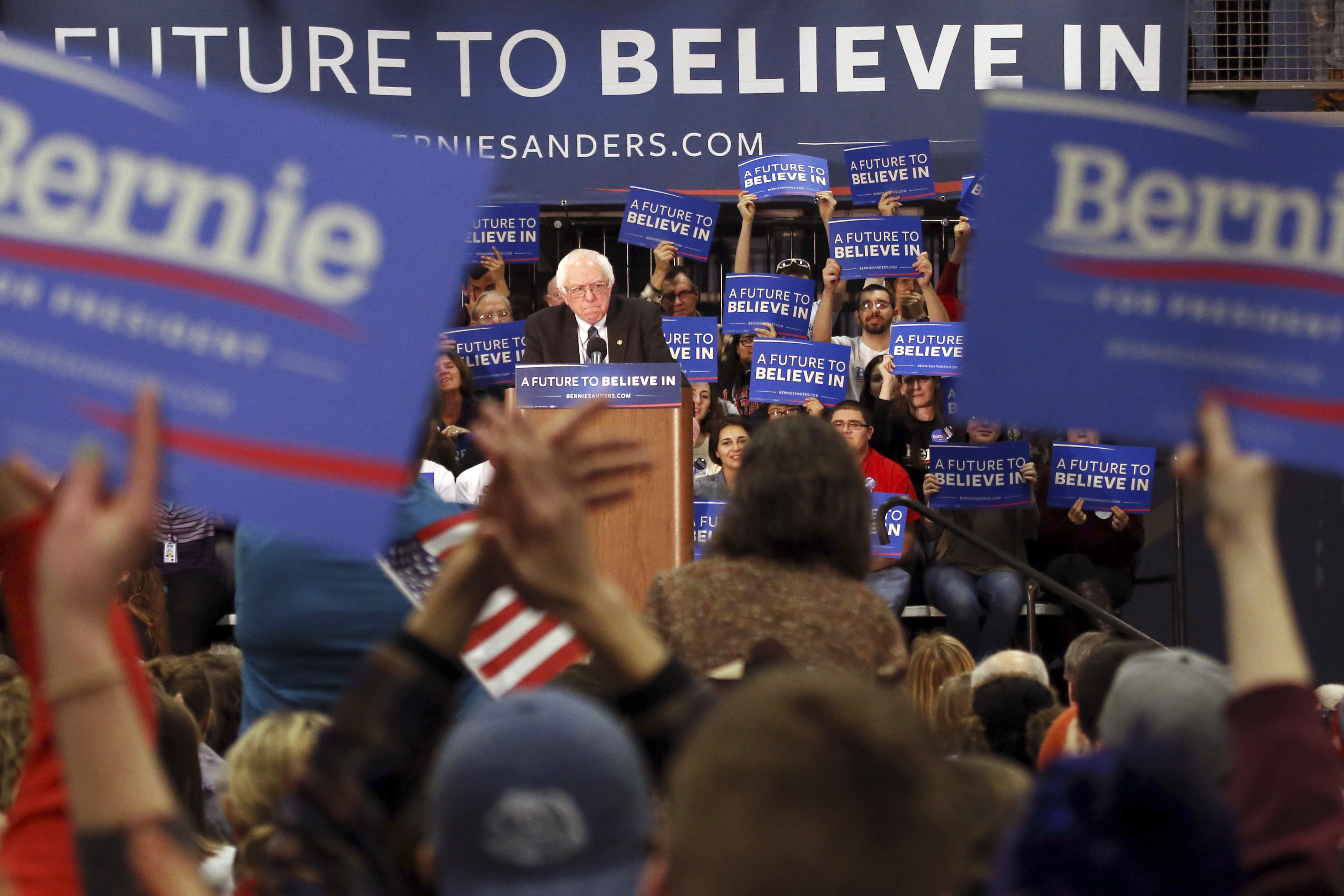 Supporters cheer as Democratic presidential candidate Sen. Bernie Sanders, I-Vt., speaks during a campaign stop on Jan. 4, 2016, in Manchester, N.H.