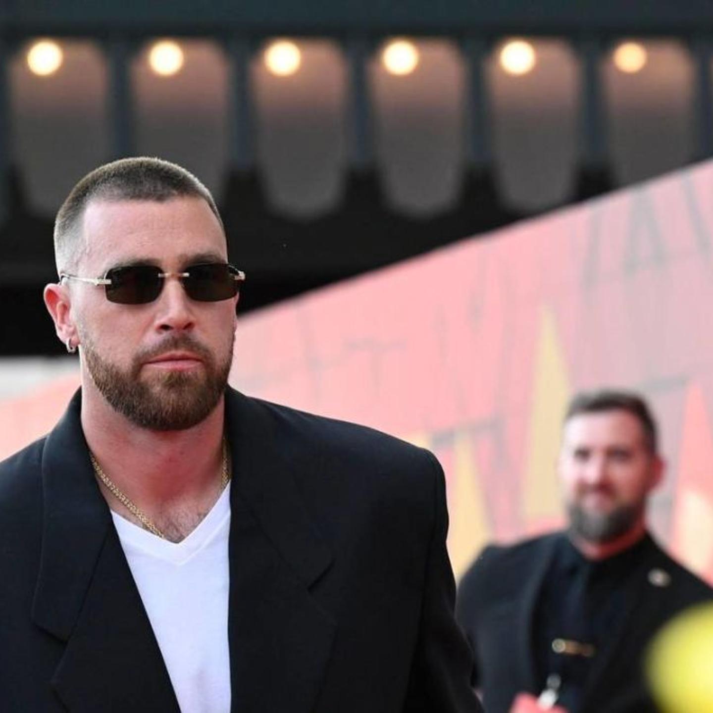 Kansas City Chiefs tight end Travis Kelce walks the red carpet at Union Station for the Super Bowl LVII championship ring ceremony in June 2023.