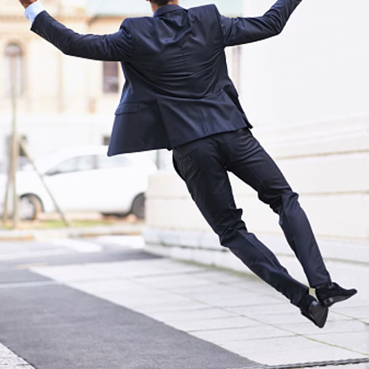 suited-man-jumping