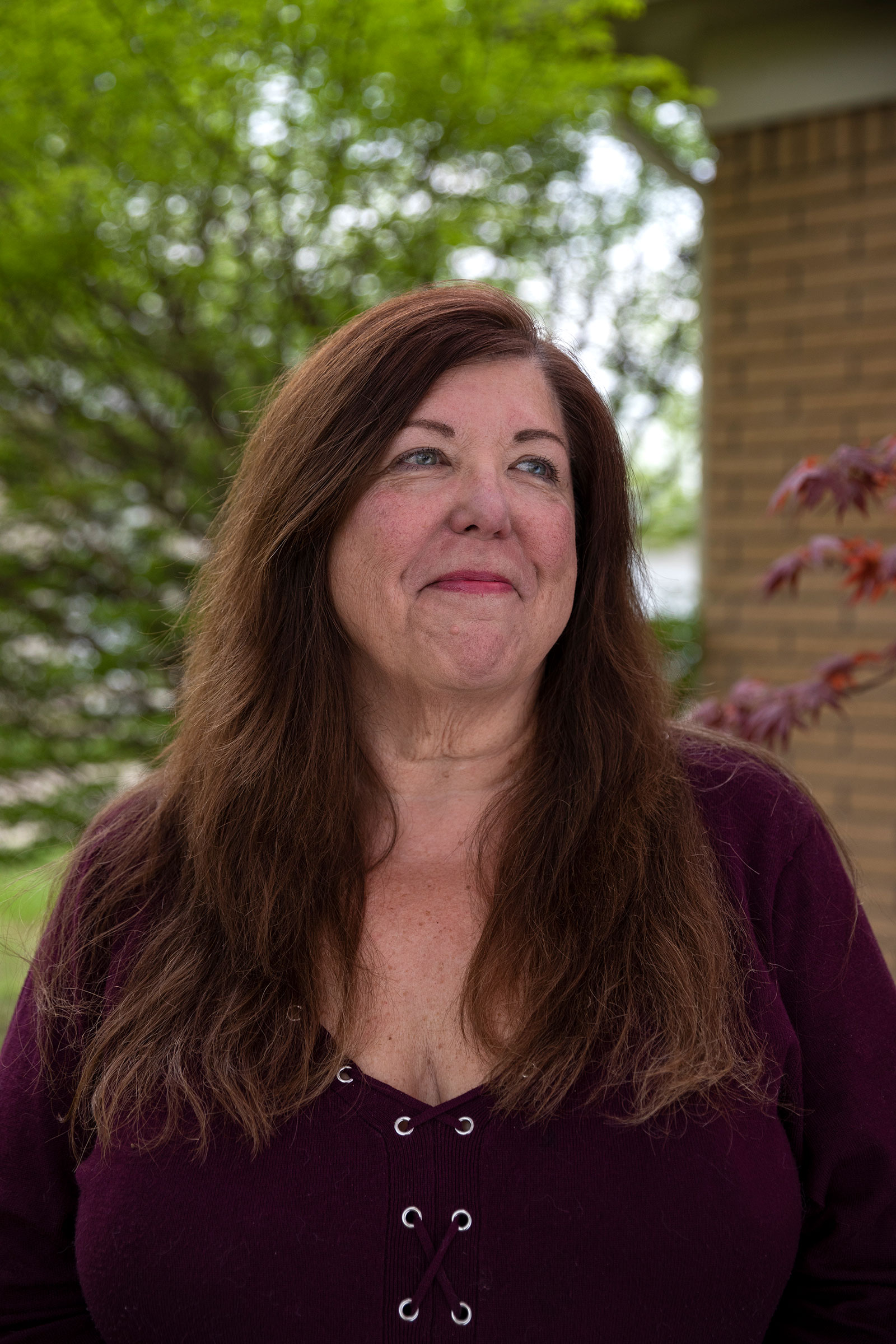 Katherine Palmer poses for a portrait outside her home in Michigan on April 29, 2021.