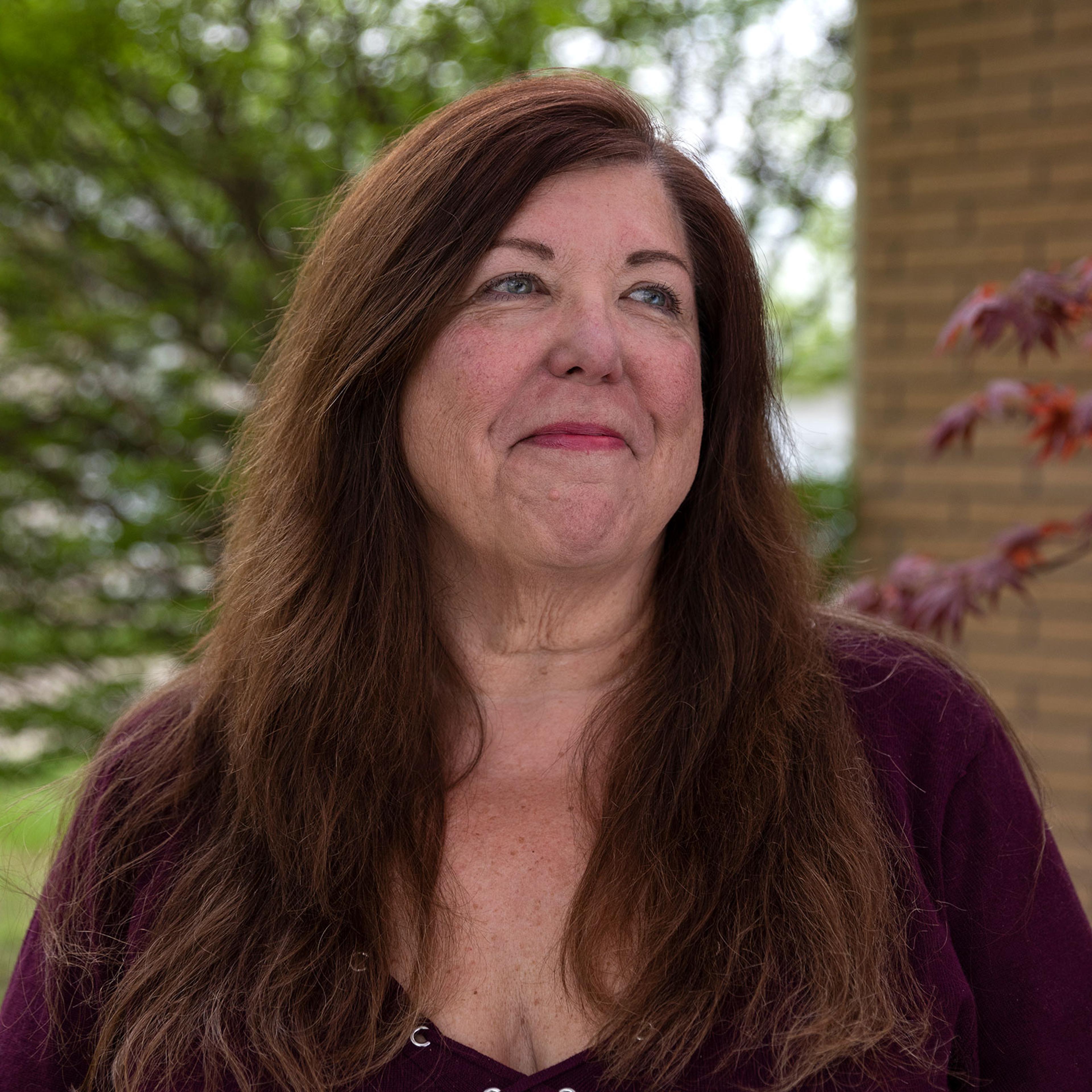 Katherine Palmer poses for a portrait outside her home in Michigan on April 29, 2021.