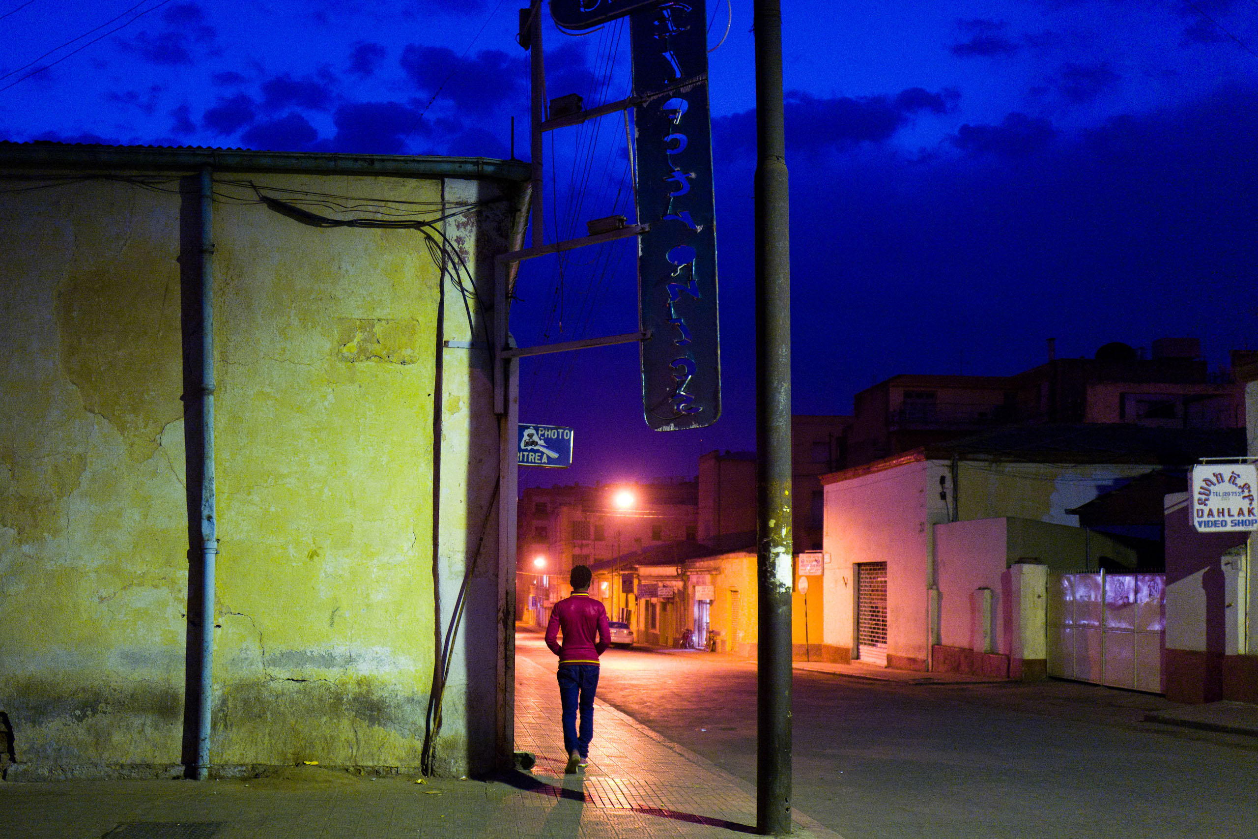 On the street at night in Asmara.