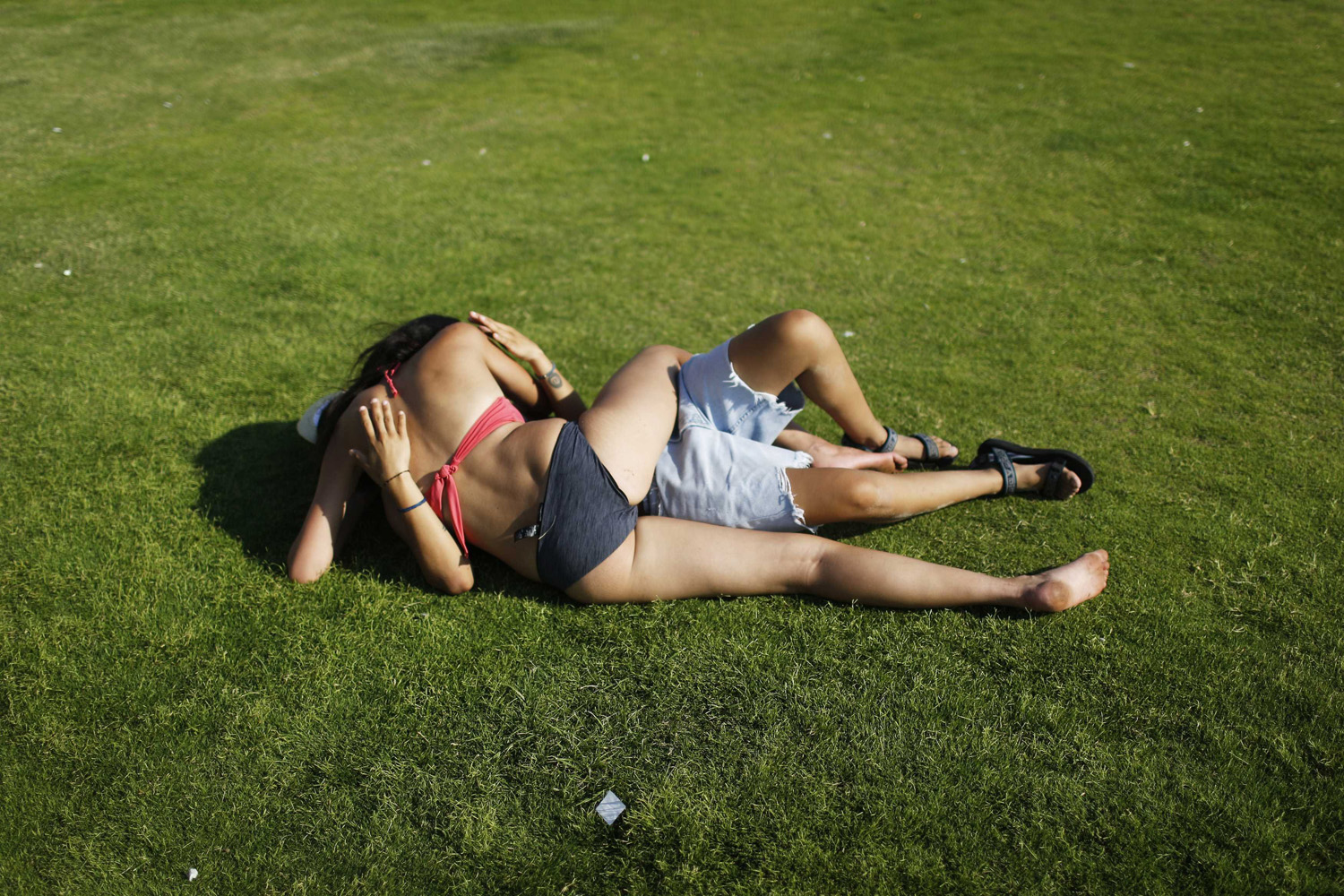 Women kiss during the annual gay pride parade in Tel Aviv