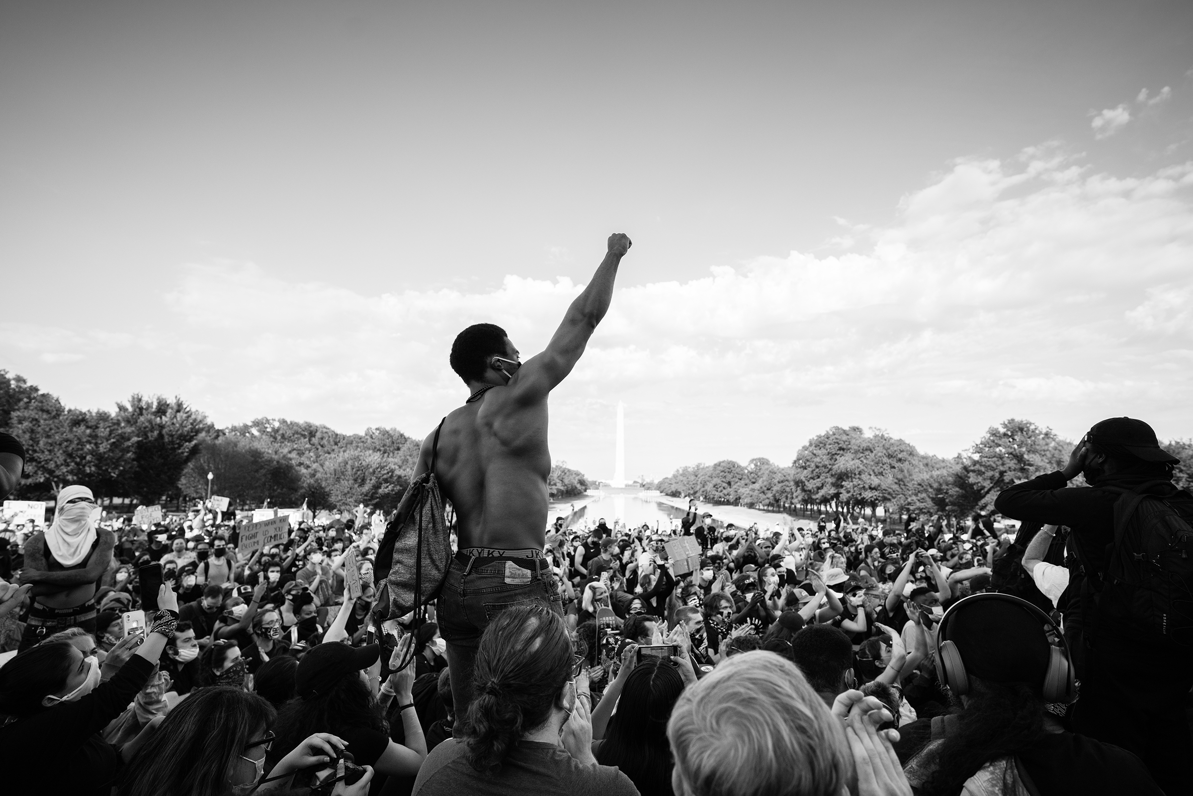 Protester Ismail Bronson raises his fist at a peaceful demonstration at the Lincoln Memorial in Washington, D.C., on June 2, eight days after George Floyd’s killing.
