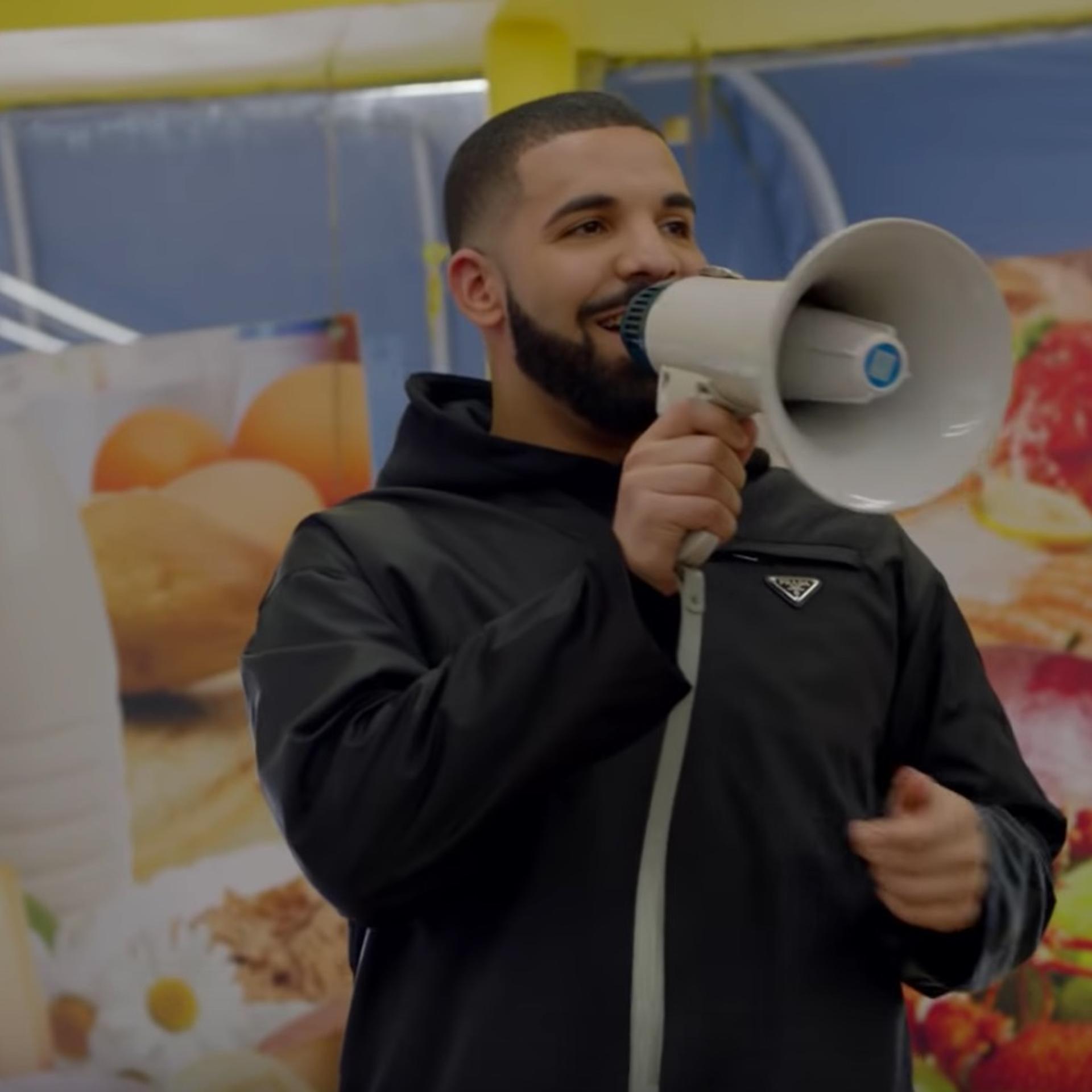 Drake gives away a million dollars in his new video God's Plan.