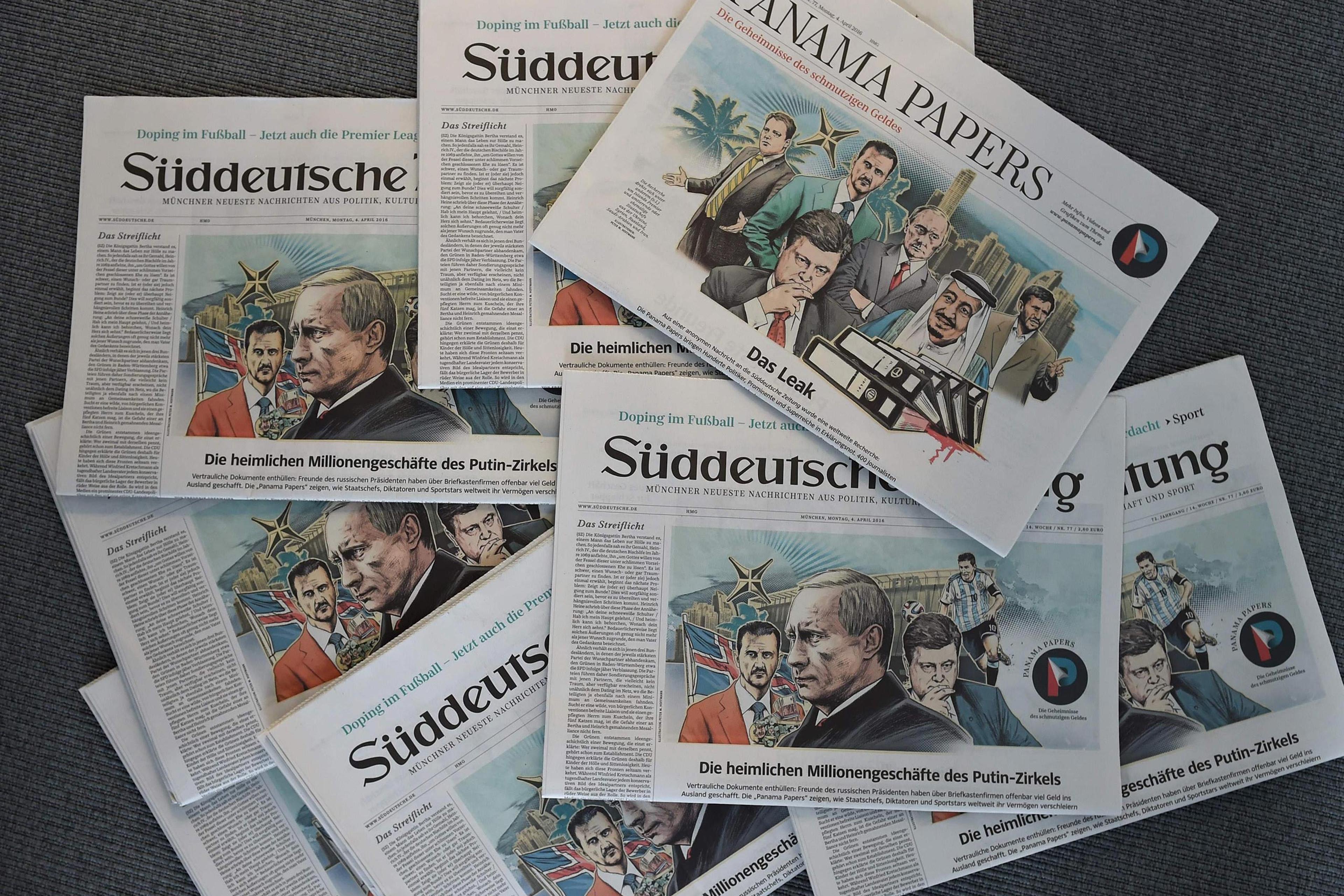Issues of the German daily Sueddeutsche Zeitung, featuring illustrations of leaders including Russian President Vladimir Putin by Peter M Hoffmann, are seen at the newspaper's office in Munich, Germany, April 7, 2016.