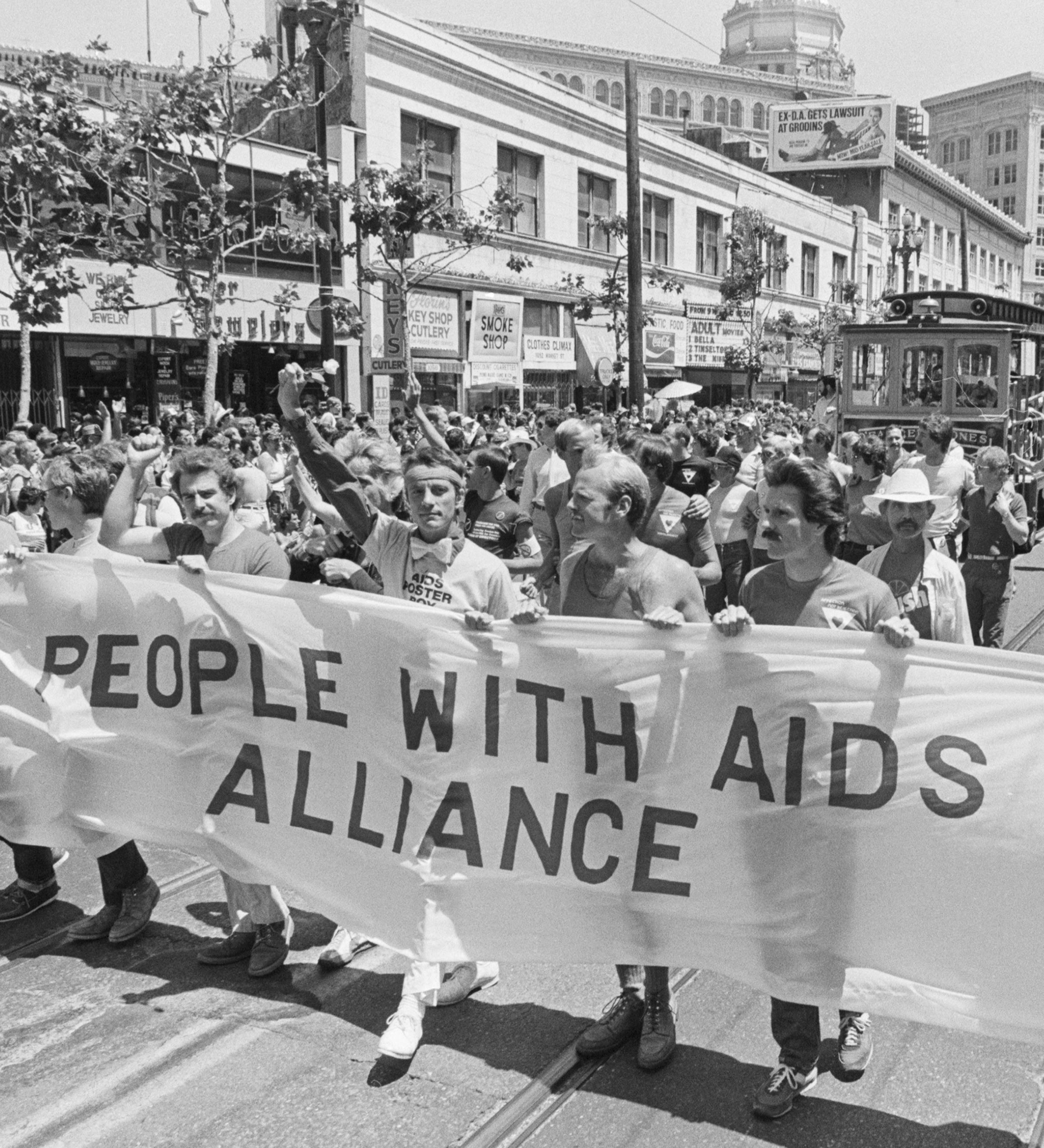 Members of the 'People With AIDS' coalition march in the San Francisco pride parade on June 26, 1983.