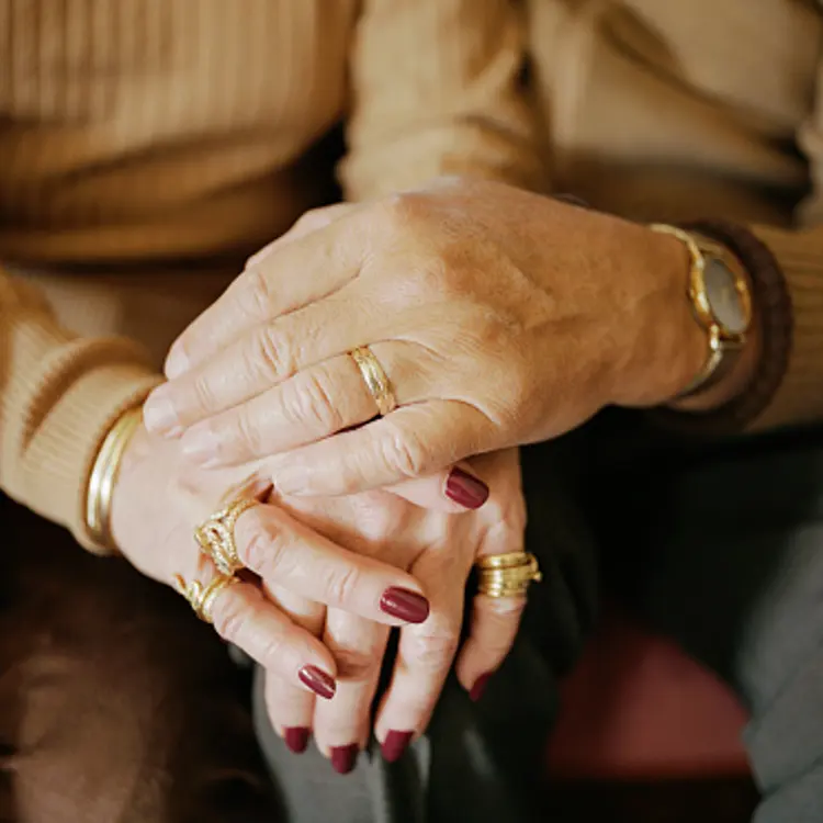 Couple holding hands