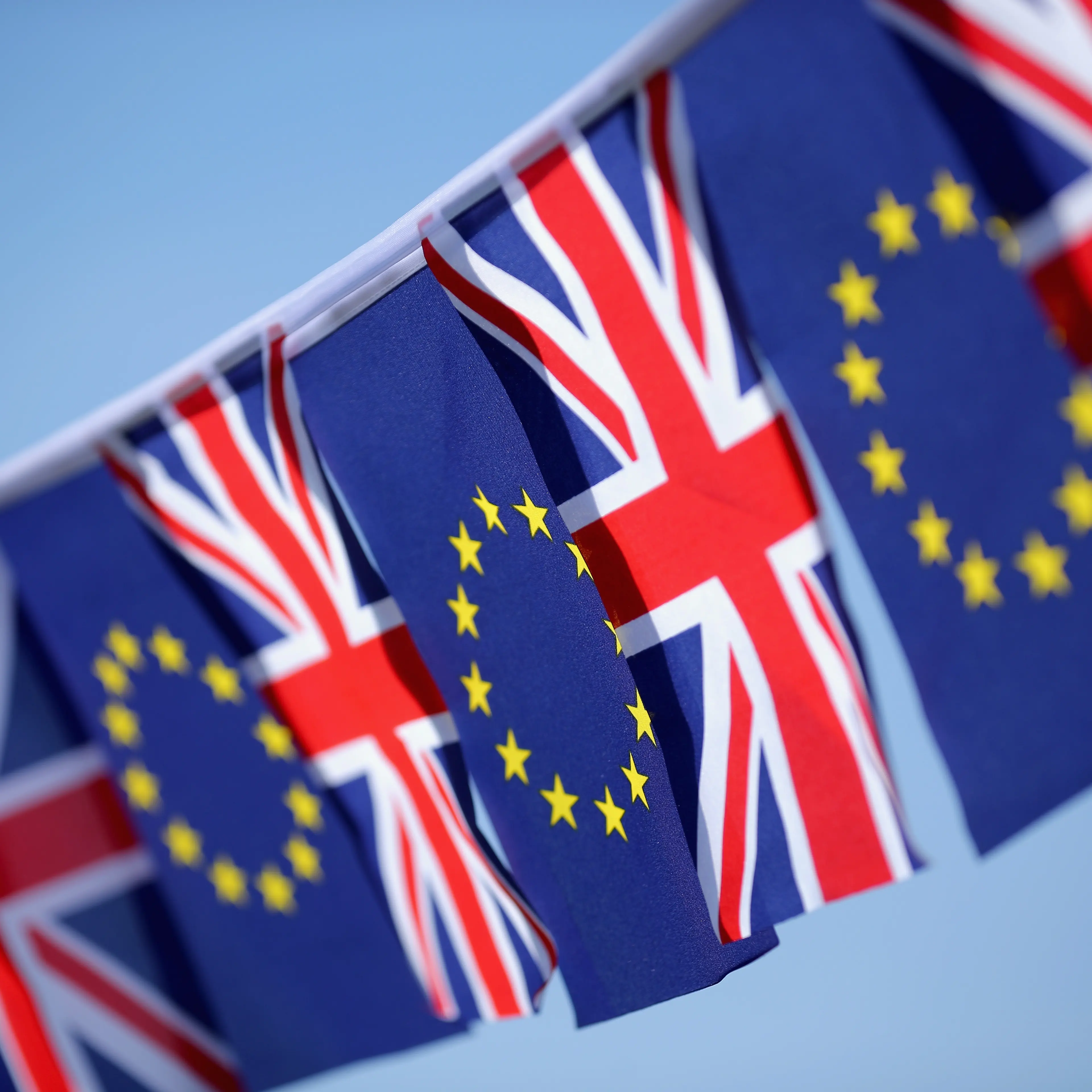 In this photo illustration, the European Union and the Union flag sit together on bunting on March 17, 2016 in Knutsford, United Kingdom.