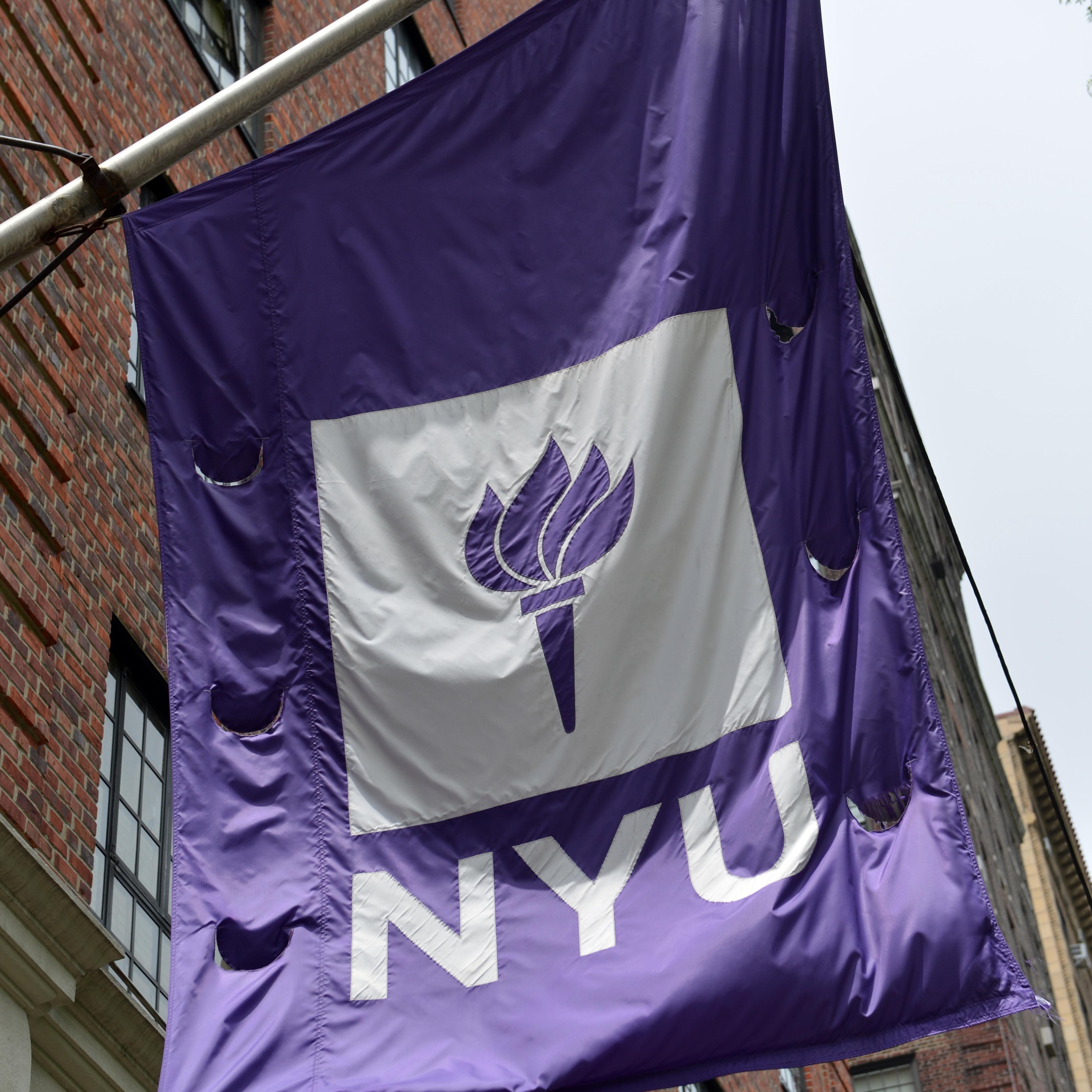 A flag flies from a building at New York