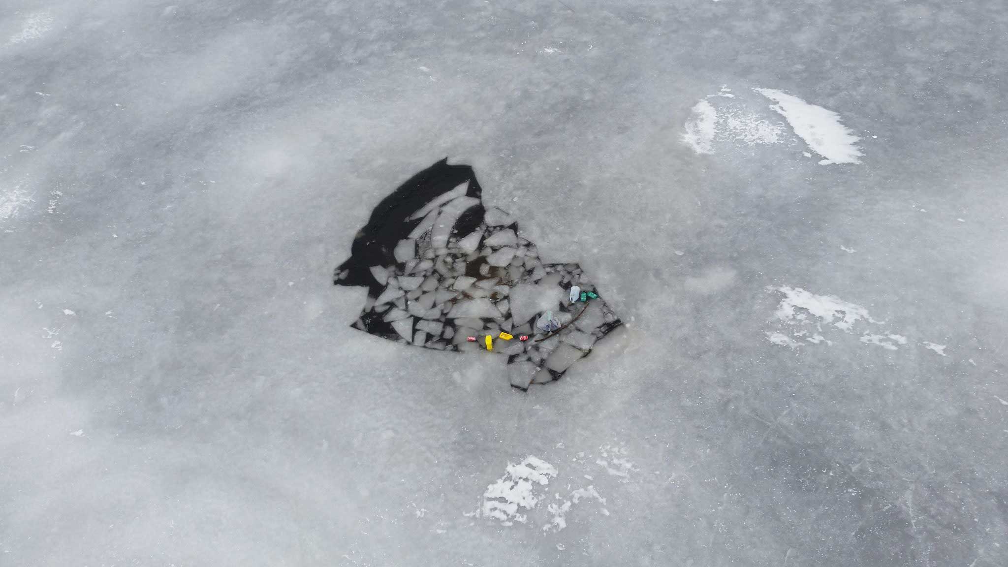 A helicopter crew from U.S. Coast Guard Air Station Atlantic City located a truck that fell through the ice on Toms River, New Jersey, March 1, 2015.