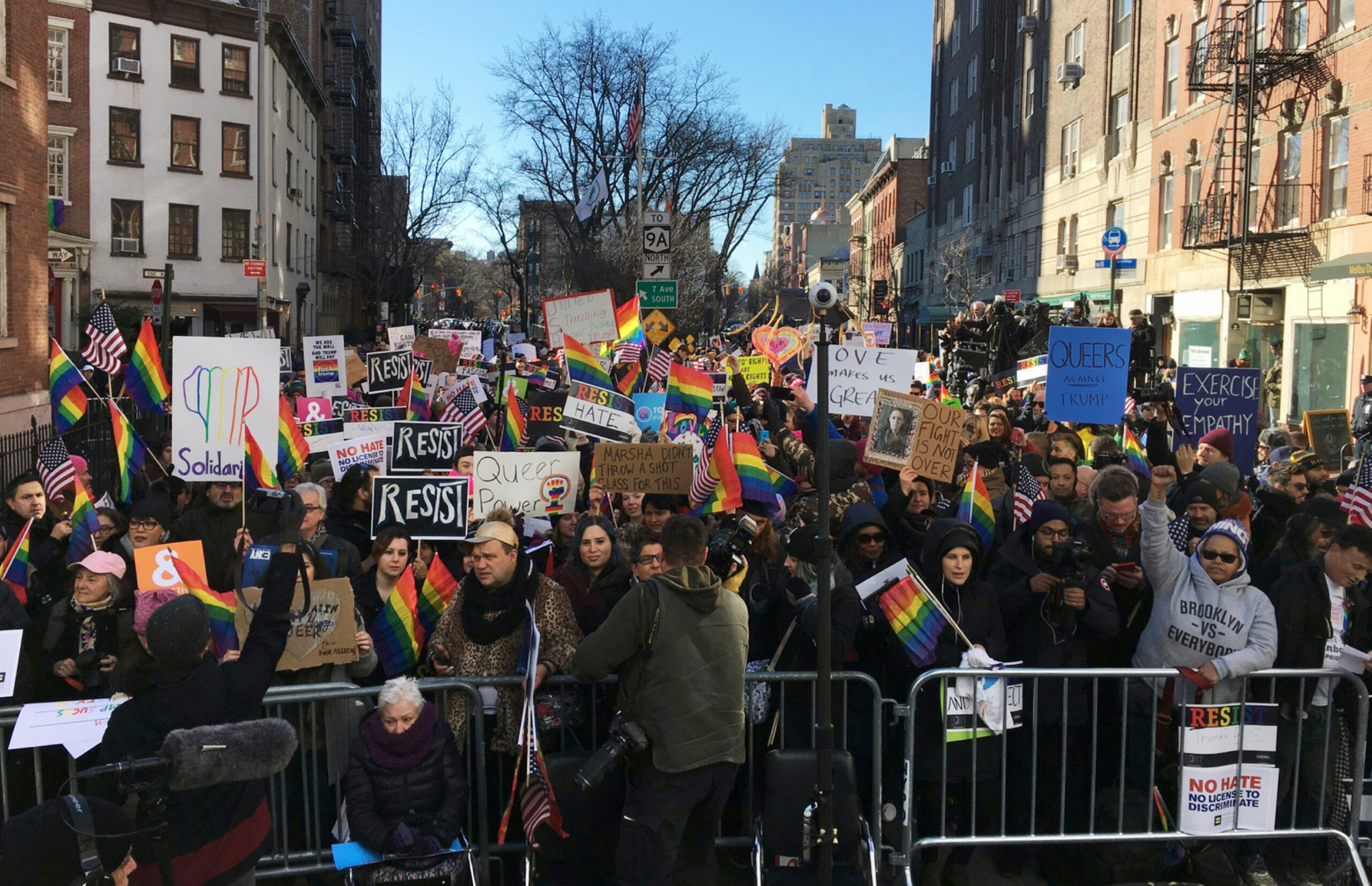 Protesters opposed to President Donald Trump's Immigration policy gather outside the Stonewall Inn, a Greenwich Village bar where the gay rights movement was born, Saturday, Feb. 4, 2017. One week before, the president issued an executive order barring p