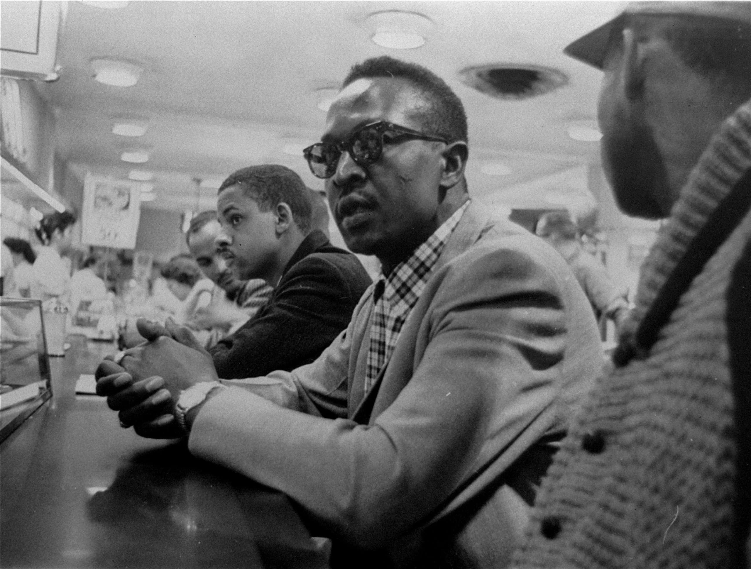 **FILE** Black students wait in vain for food service at this F.W. Woolworth store in Greensboro, NC, in this April 20, 1960 file photo. The Woolworth's lunch counter that became a symbol of the nation's civil rights movement in 1960 is part of an exhibi