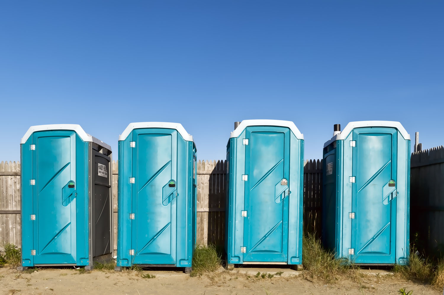 Portable toilets at the beach.