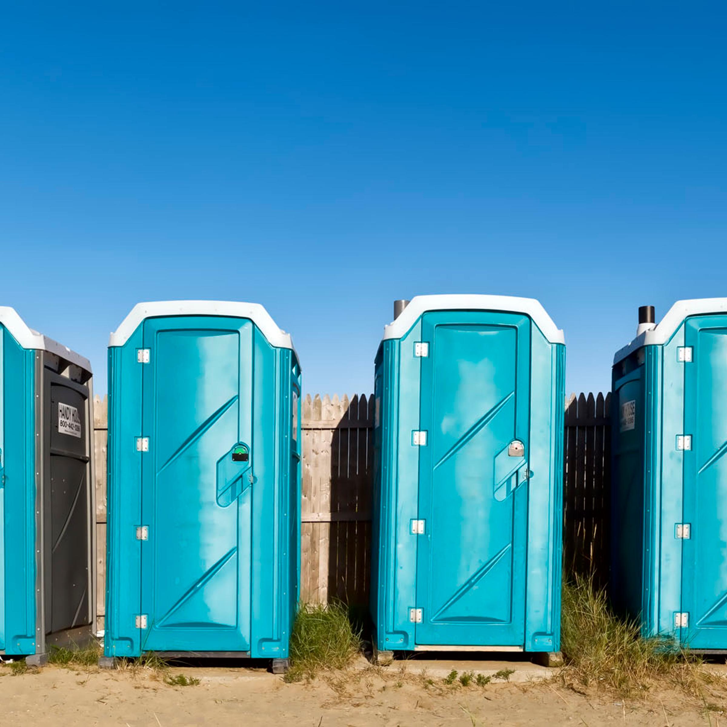 Portable toilets at the beach.