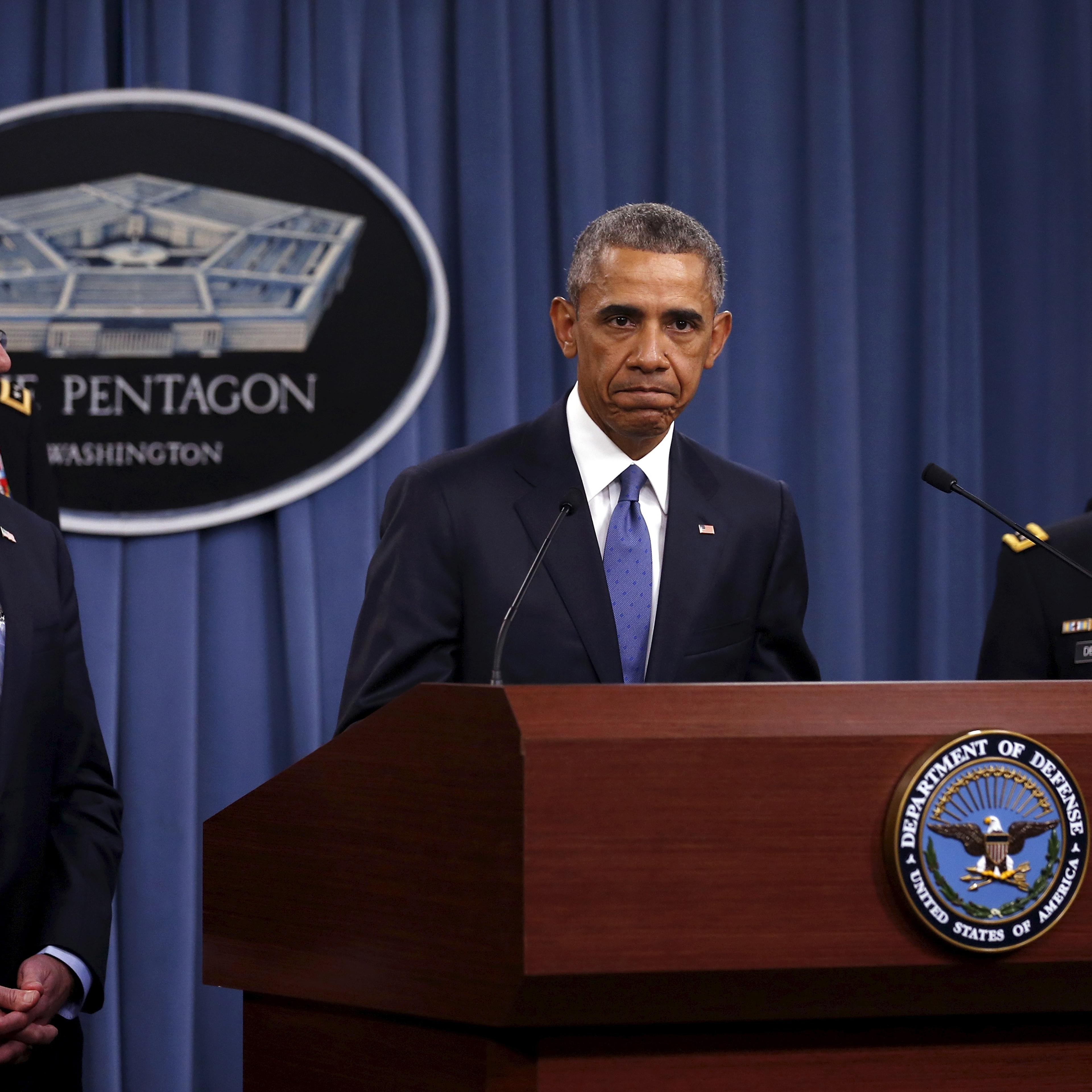 Obama, flanked by Carter and Dempsey, pauses as he delivers remarks after a briefing on U.S. efforts against the Islamic State (ISIS), at the Pentagon in Arlington, Virginia