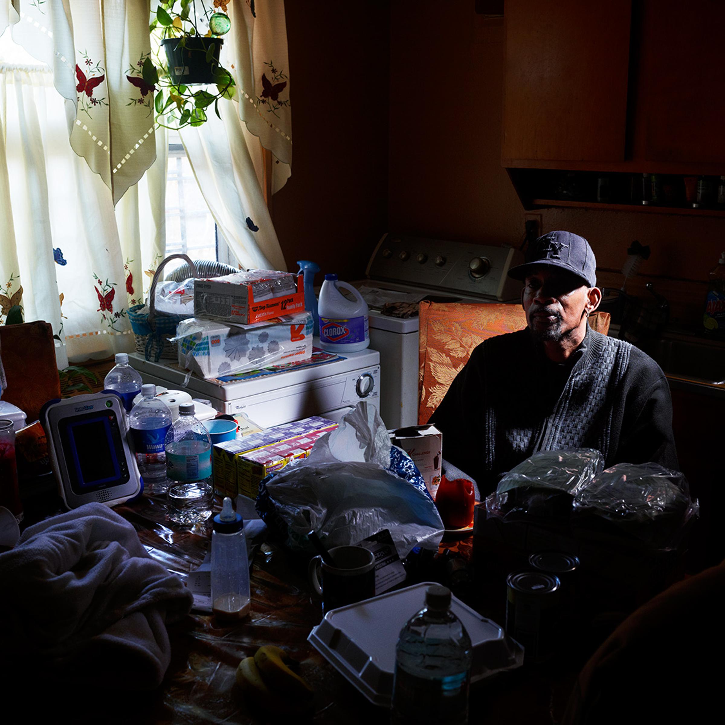 Image: Ervin Pridgen, 52, in his kitchen on the first floor of the Redfern Houses.