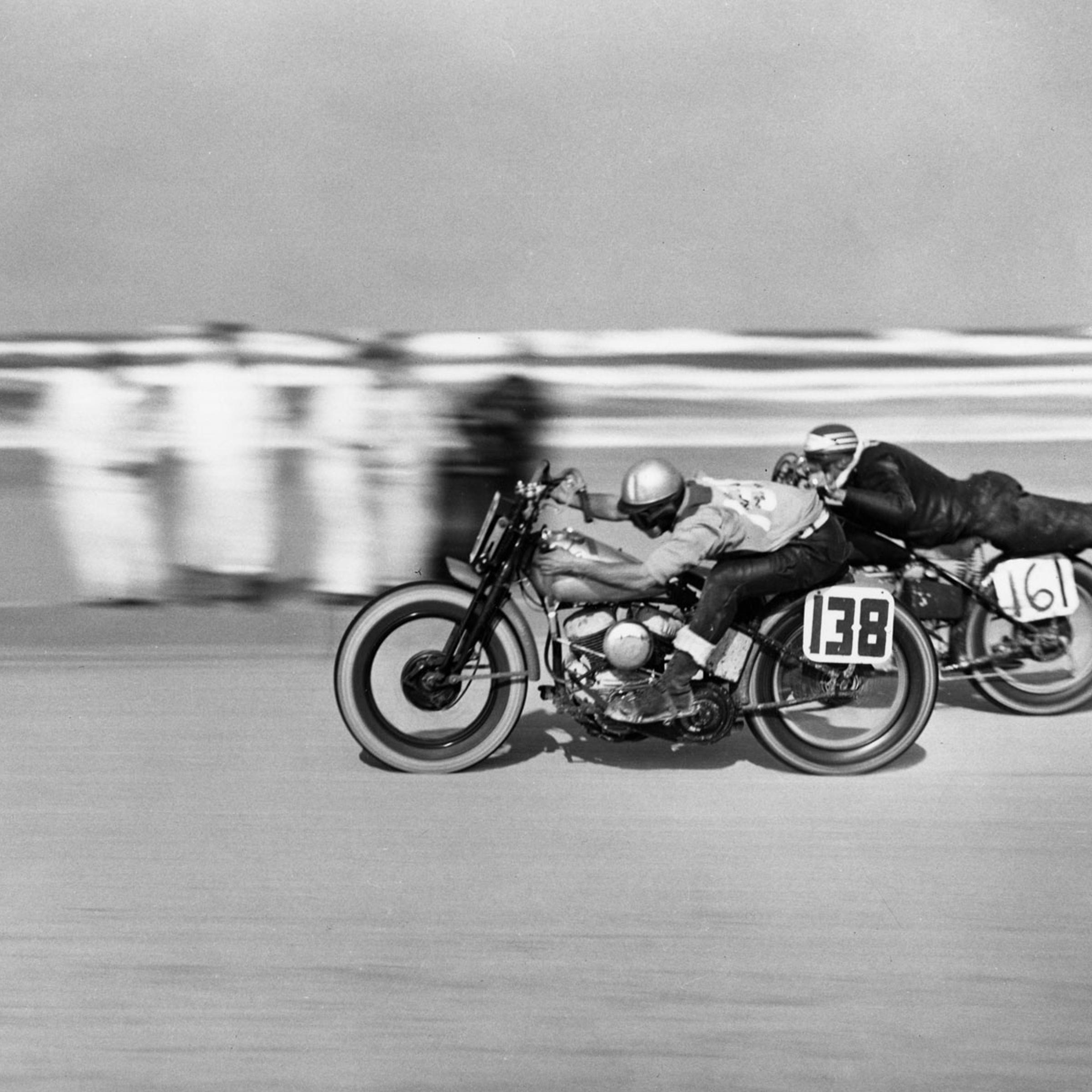 Number 161 Norman Teleford streamlines himself during a motorcycle race at Daytona Beach, March 1948.