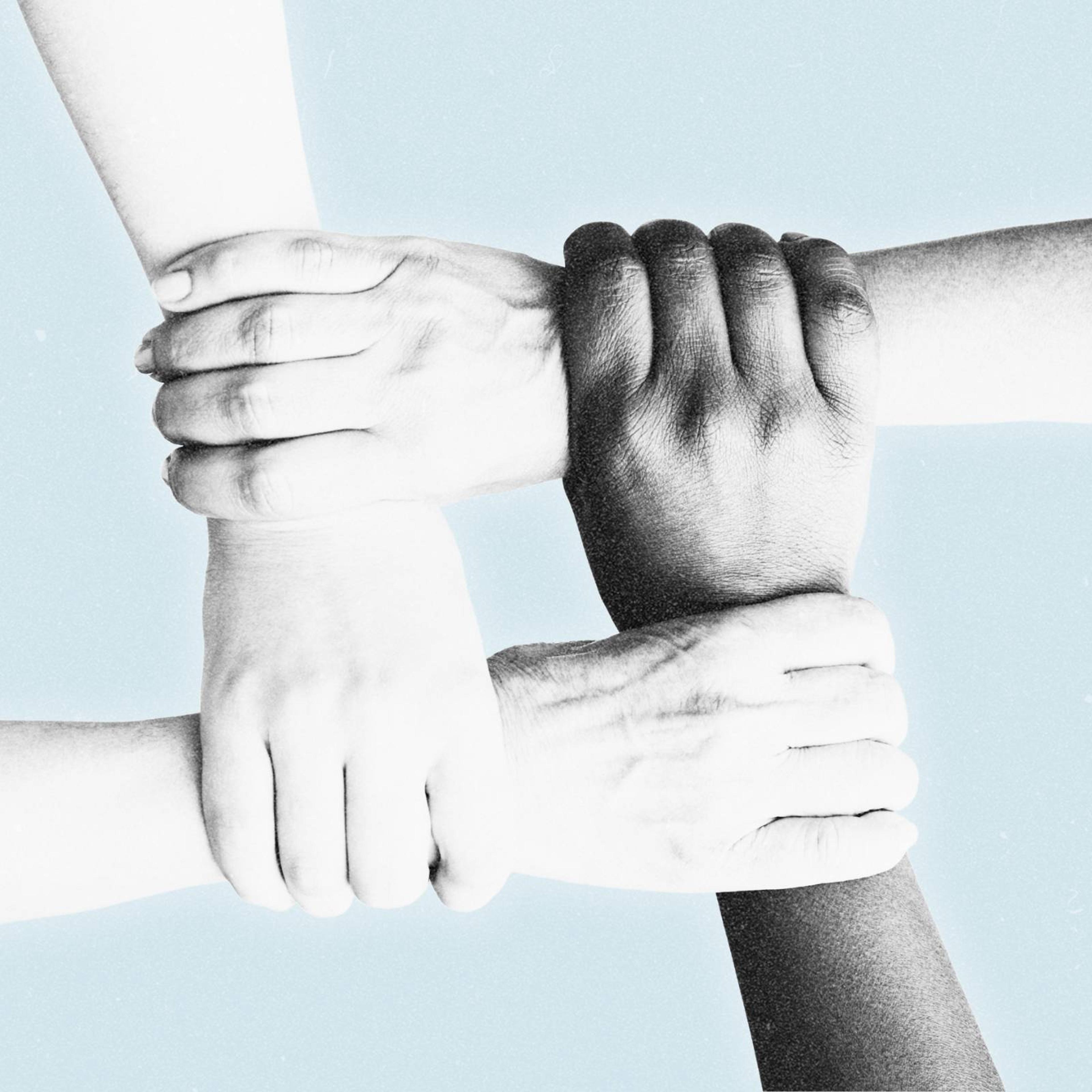 four hands holding each other by the wrists to form a square on a light blue background