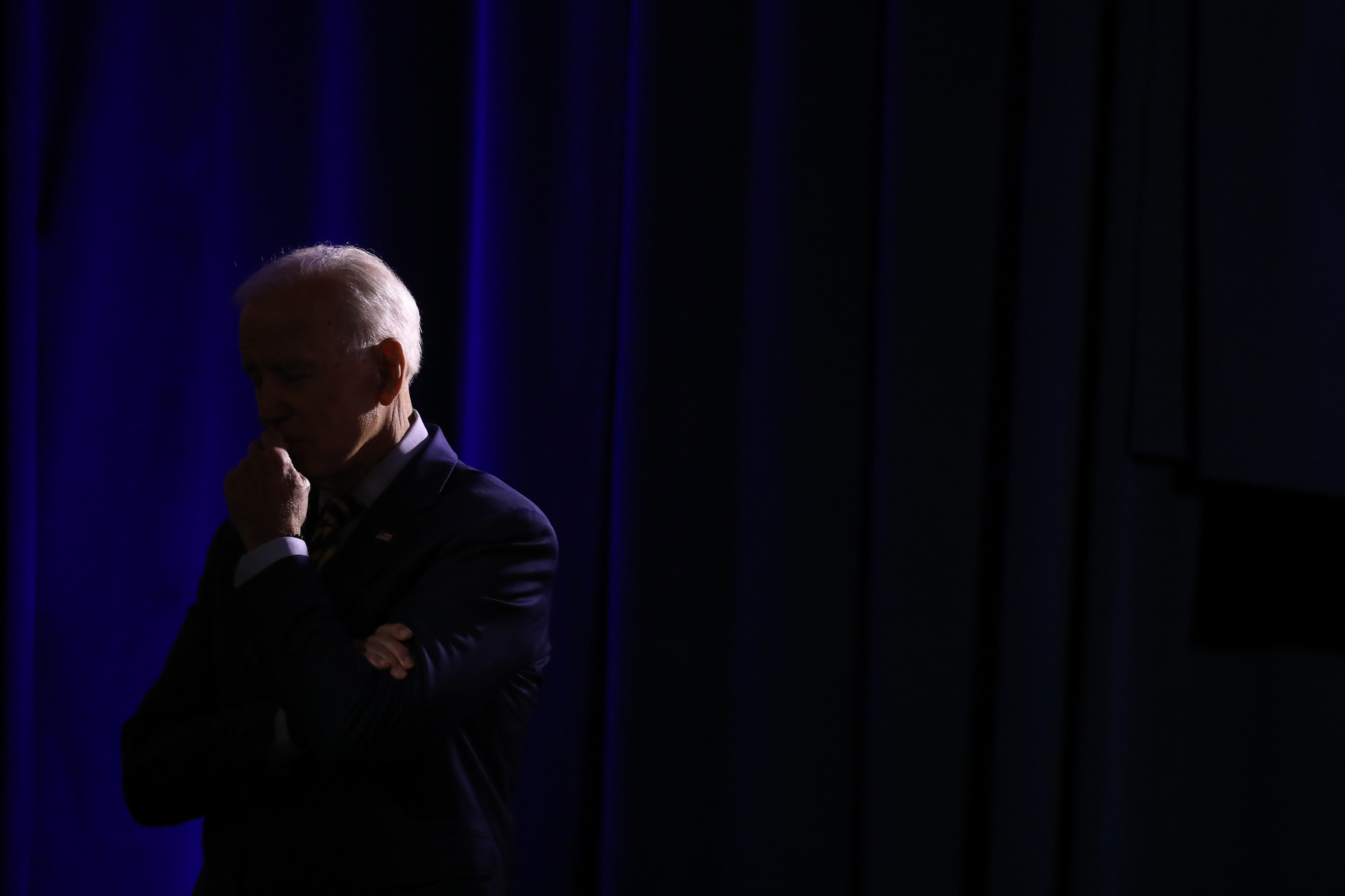 Joe Biden listens to an attendee at an election forum event in Columbia, S.C. on June 22, 2019