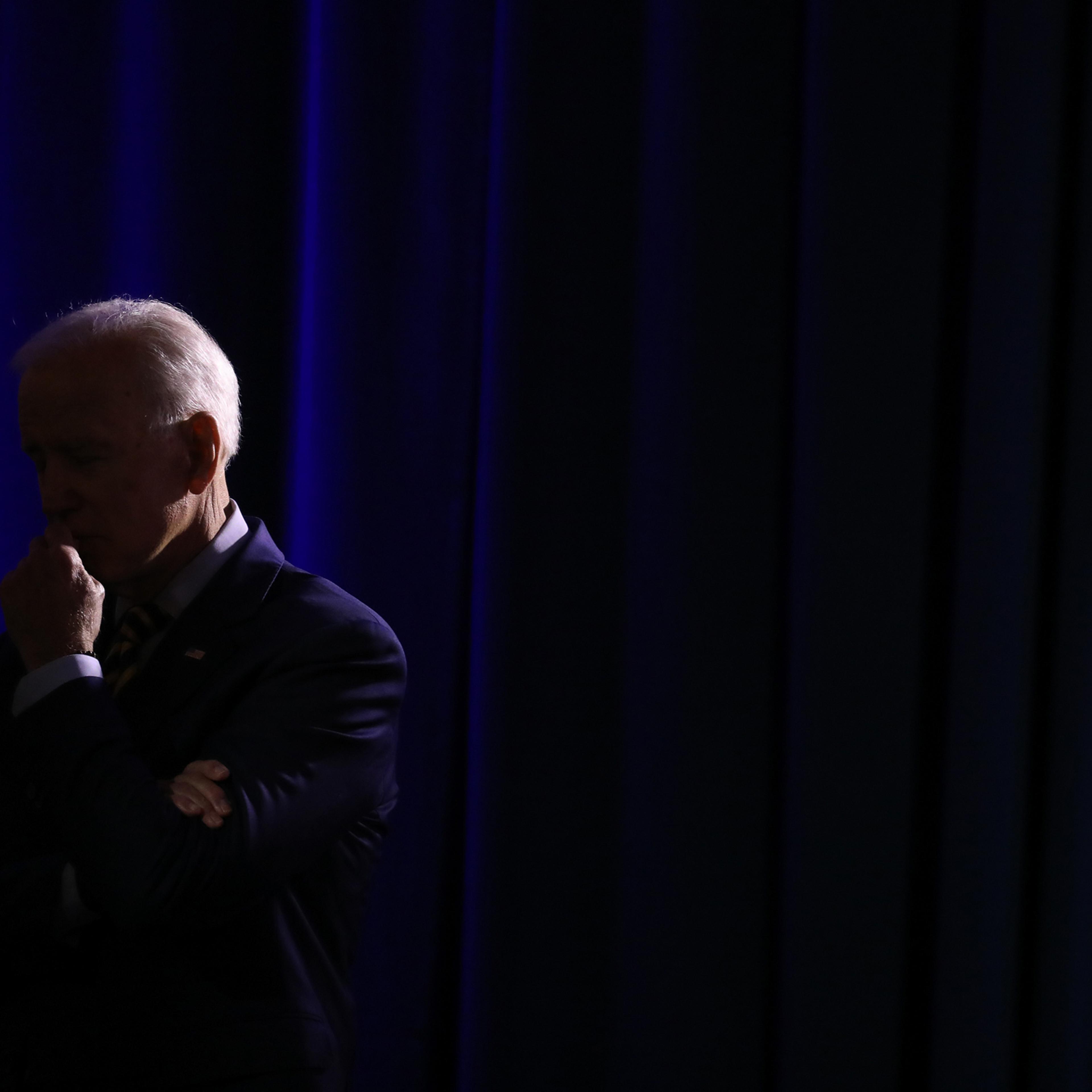 Joe Biden listens to an attendee at an election forum event in Columbia, S.C. on June 22, 2019