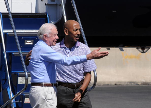 Jimmy Carter Returns American Held In North Korea To U.S.