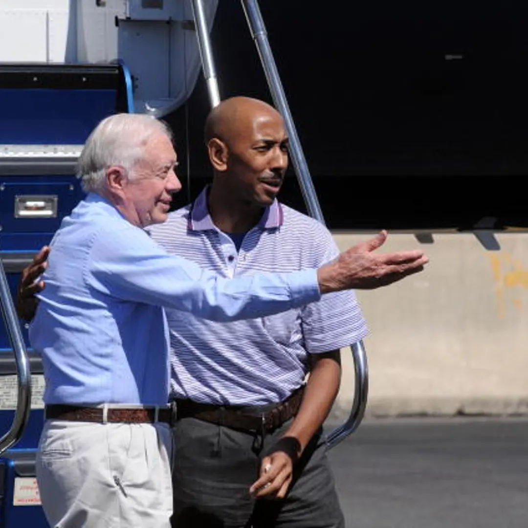 Jimmy Carter Returns American Held In North Korea To U.S.