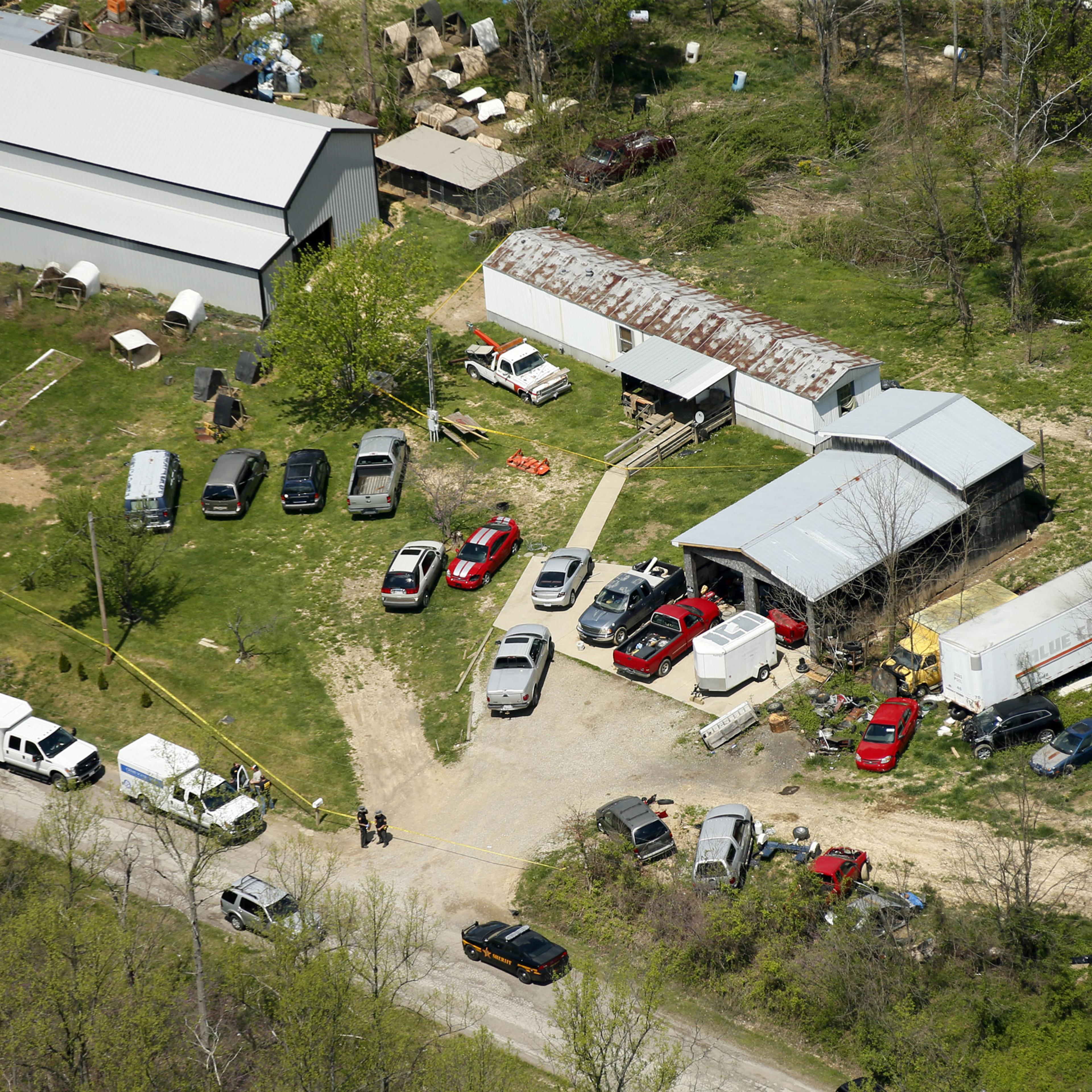 This aerial photo shows one of the locations being investigated in Pike County, Ohio, as part of an ongoing homicide investigation, Friday, April 22, 2016. Several people were found dead Friday at multiple crime scenes in rural Ohio, and at least most of