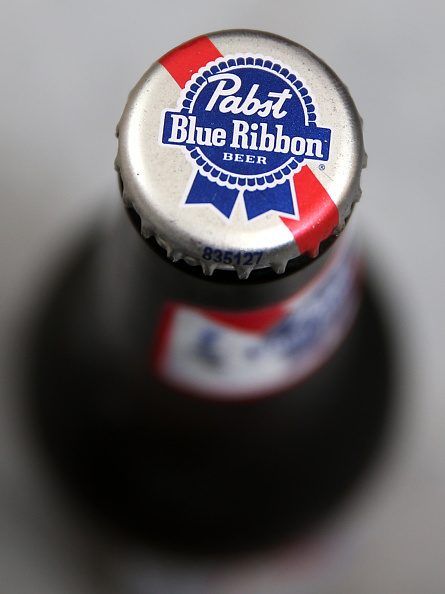 A Pabst Blue Ribbon beer bottle.