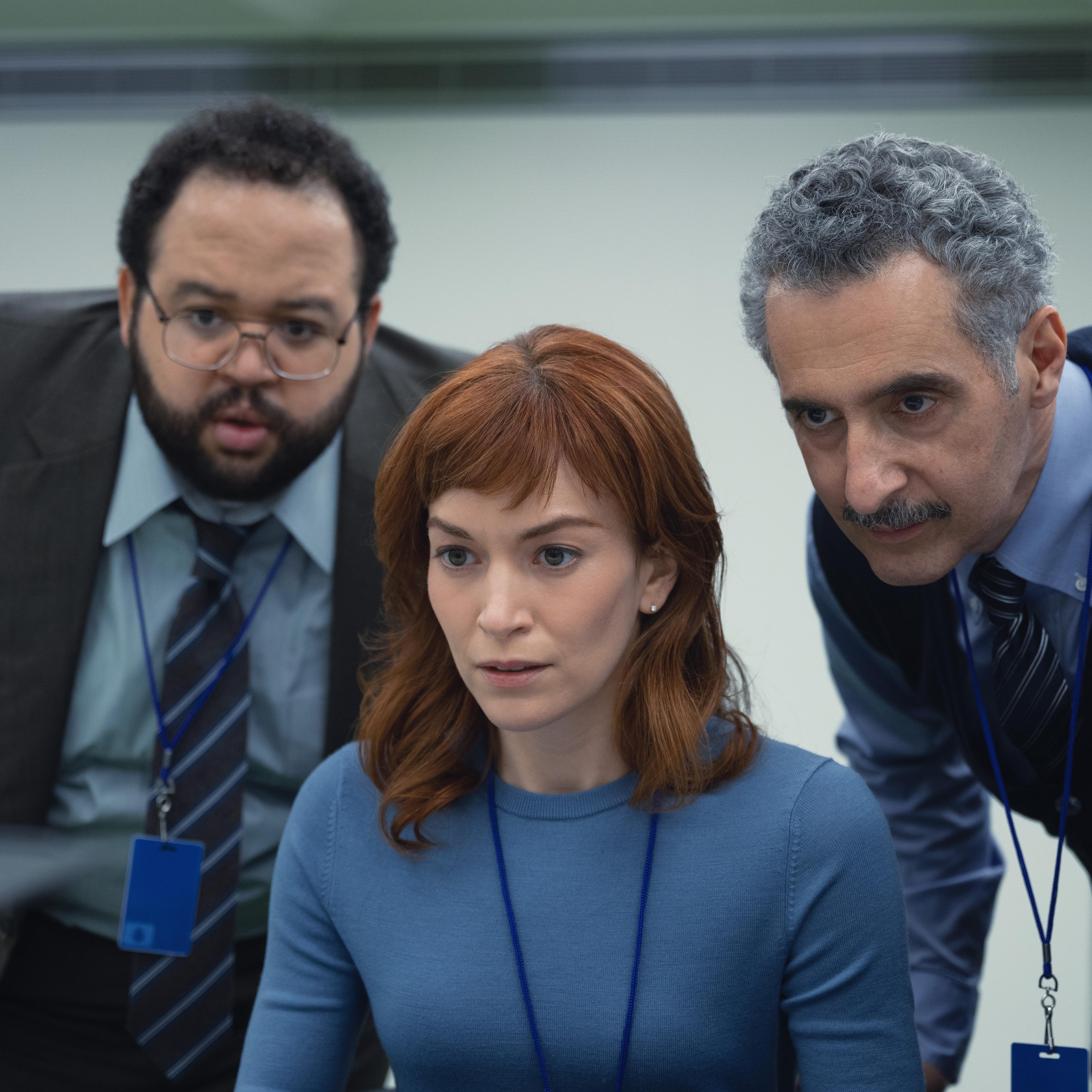 From left: Zach Cherry, Britt Lower and John Turturro in 'Severance'