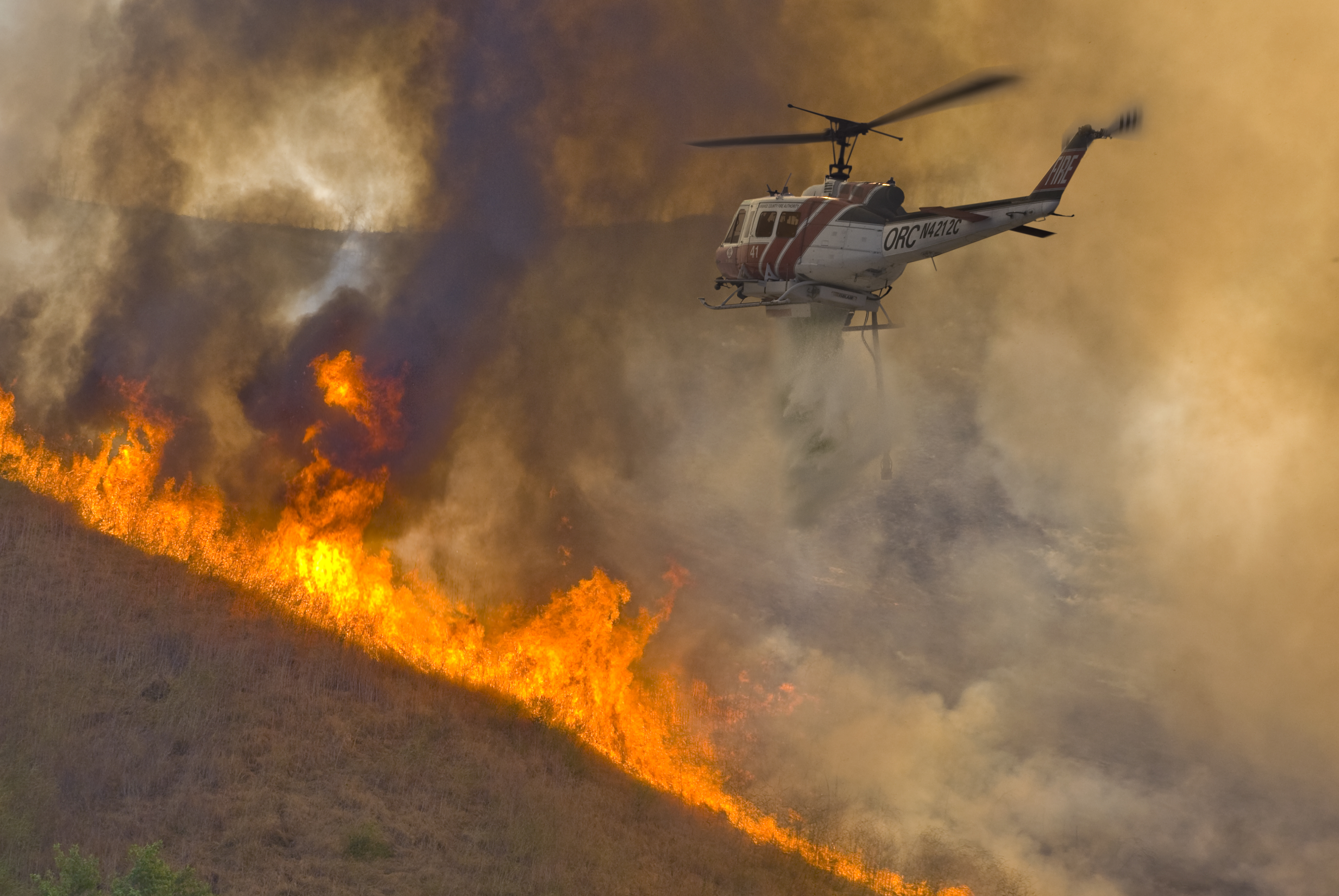 Forest fire and helicopter