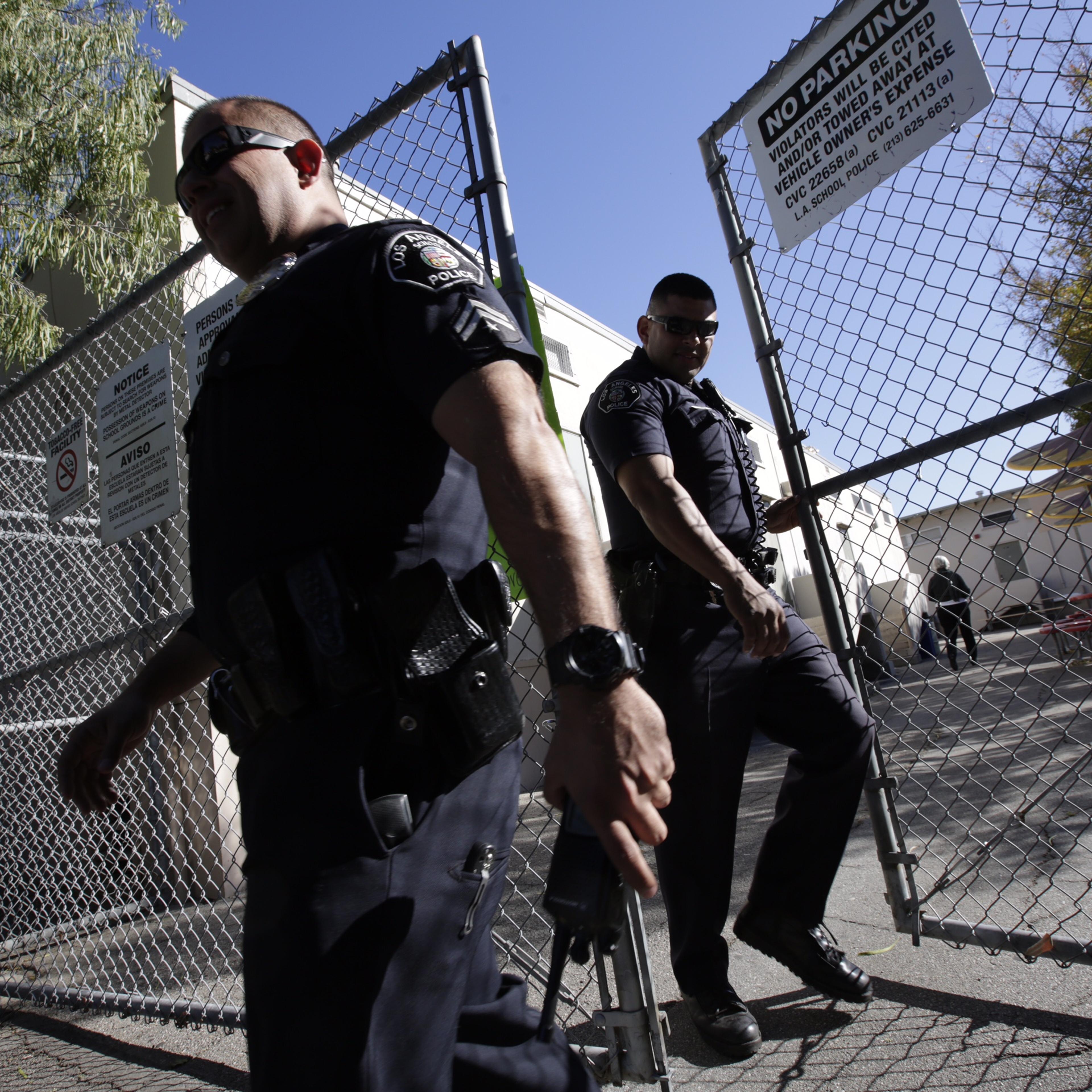 Los Angeles School Police search Theodore Roosevelt High School in the Boyle Heights area of Los Angeles over a threat of violence.
