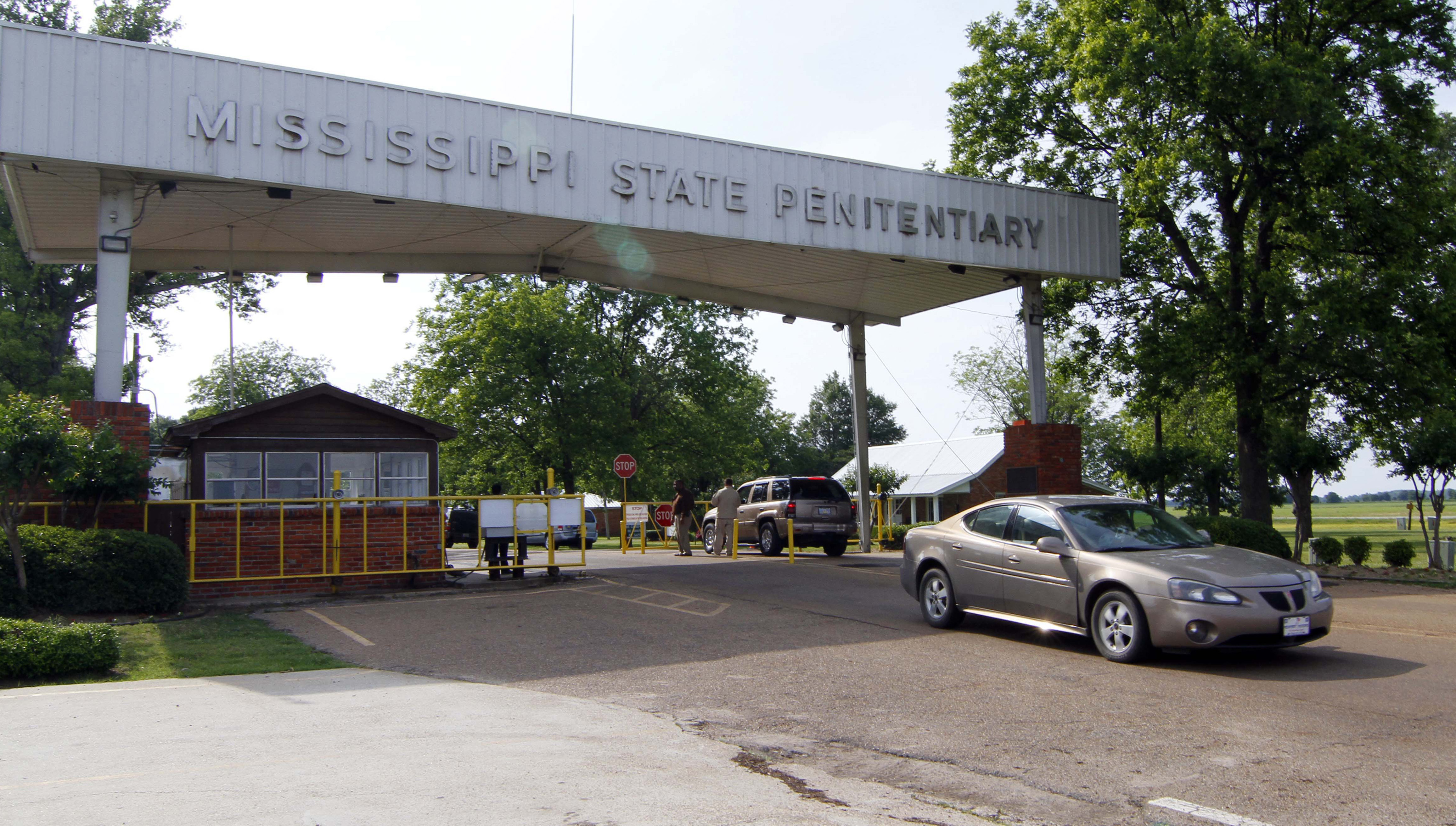 Traffic moves past the front of the Mississippi State Penitentiary in Parchman, Miss.