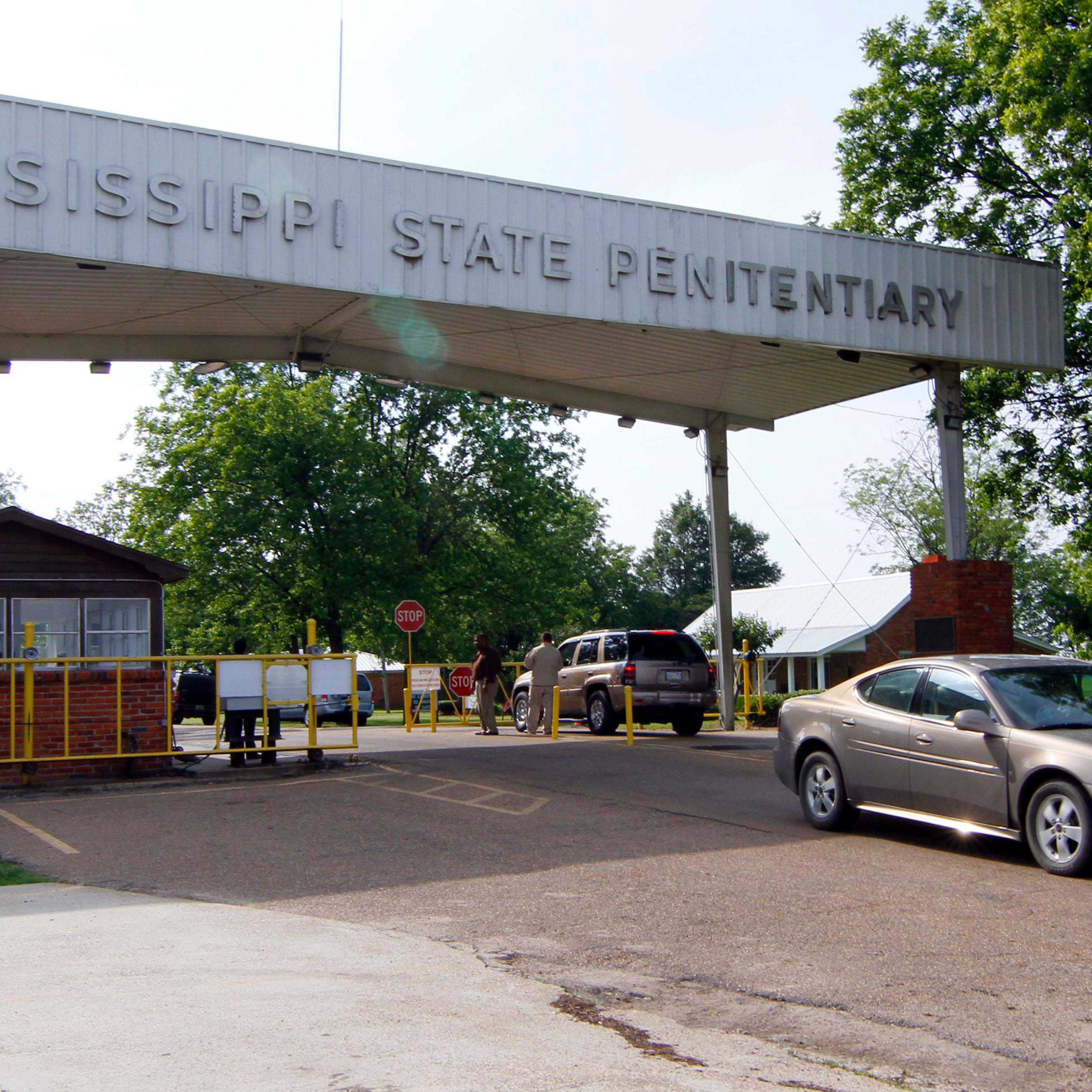 Traffic moves past the front of the Mississippi State Penitentiary in Parchman, Miss.