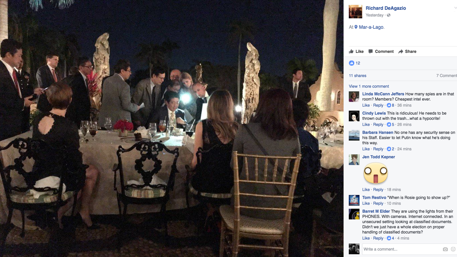A screengrab of a photo posted on the Facebook page of Richard DeAgazio was said to show Japanese Prime Minister Shinzo Abe huddling with staffers during dinner at President Trump's Mar-a-Lago residence after news spread about North Korea's missile launc