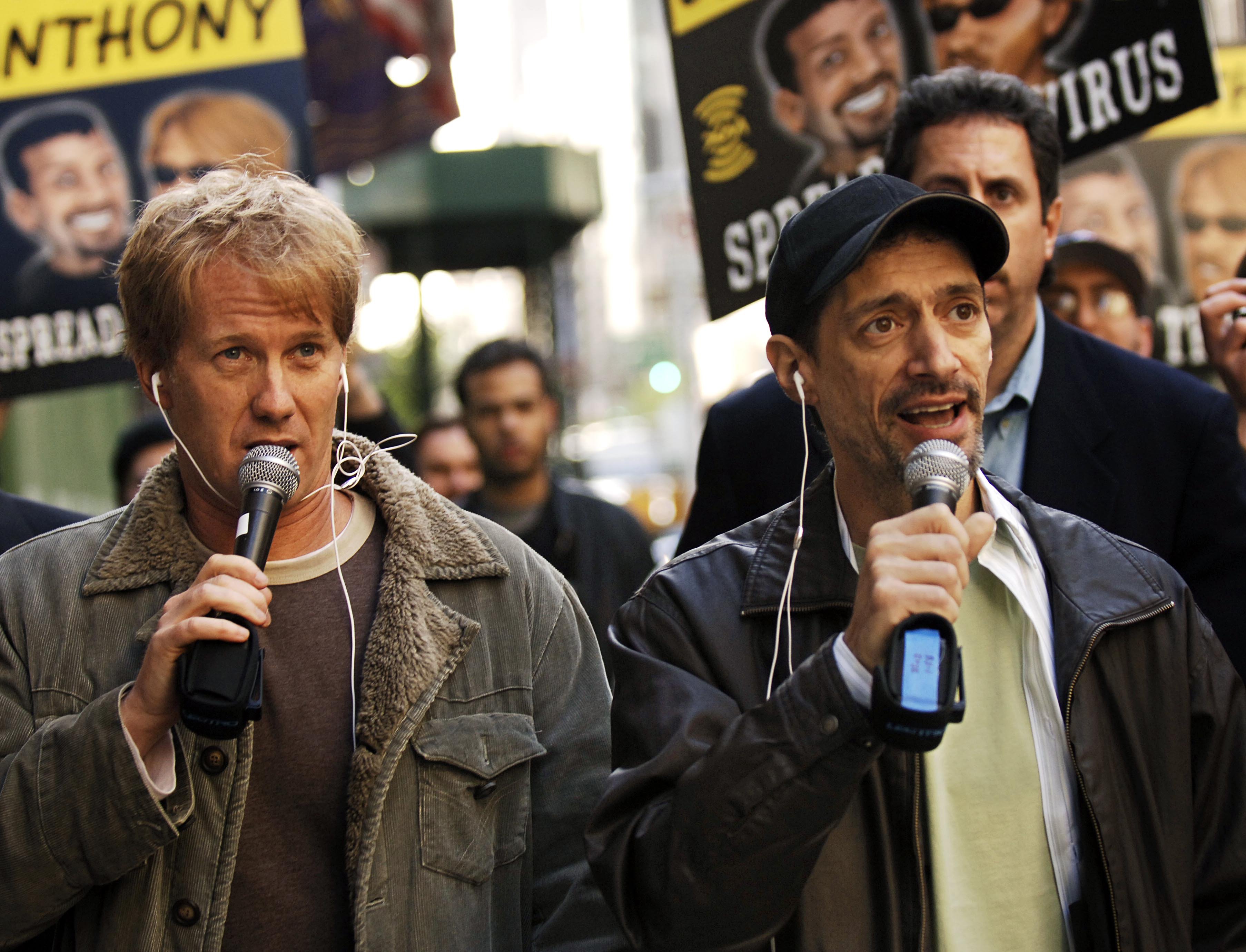 Radio shock jocks Greg "Opie" Hughes, left, and Anthony Cumia, right, leave CBS Radio studios on 57th Street with fans after finishing their first morning show, in New York. Cumia of the "Opie & Anthony" radio show on April 26, 2006.