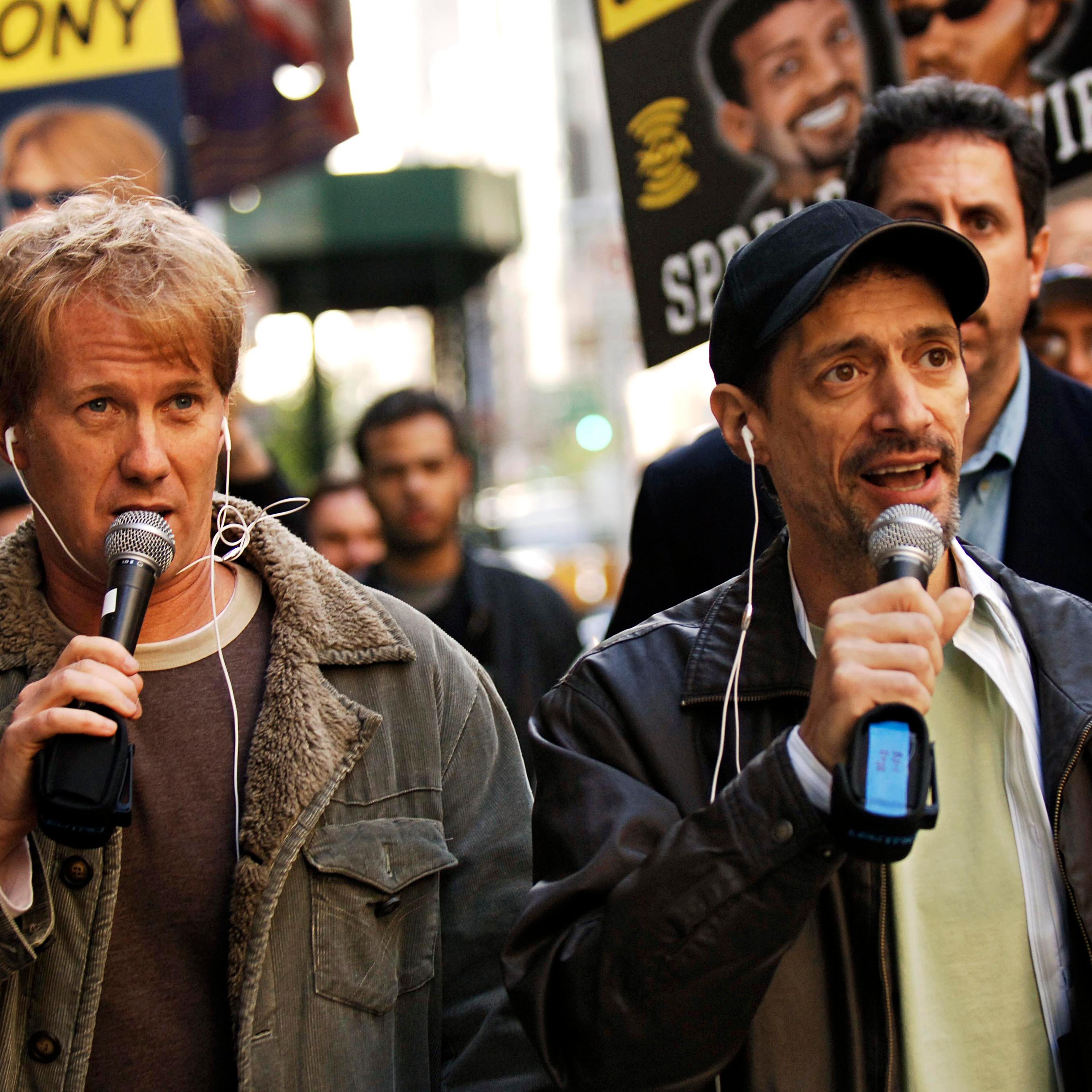 Radio shock jocks Greg "Opie" Hughes, left, and Anthony Cumia, right, leave CBS Radio studios on 57th Street with fans after finishing their first morning show, in New York. Cumia of the "Opie & Anthony" radio show on April 26, 2006.
