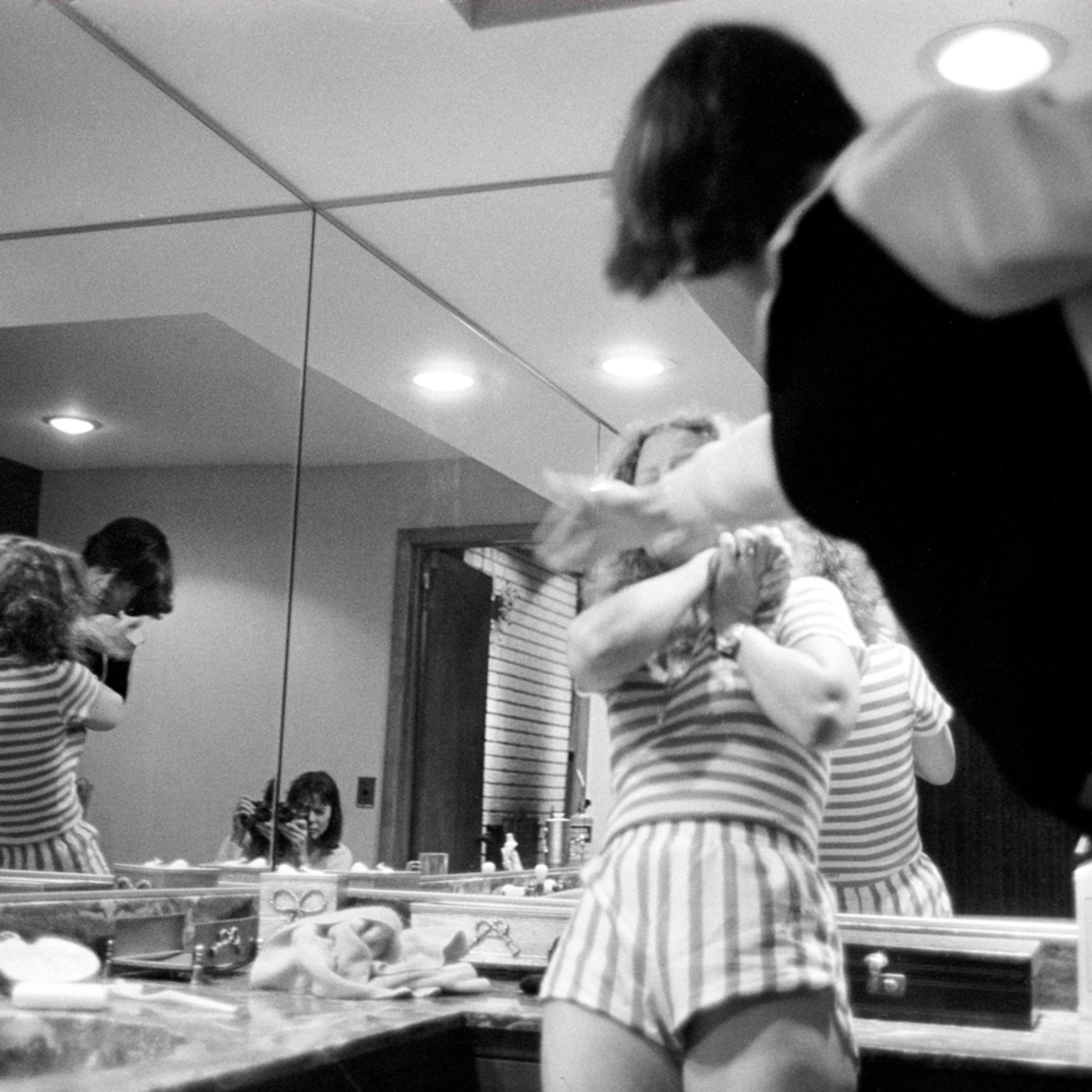 Donna Ferrato has documented domestic violence for more than 30 years. Here, she gives LightBox the backstory behind some of her most harrowing images. <br><br>
I heard Lisa screaming and things breaking. As soon as I entered the bathroom Garth raised his hand to slap his wife in the face. I took the picture because without it I knew noone would ever believe it happened. Saddle River, N.J., 1982.