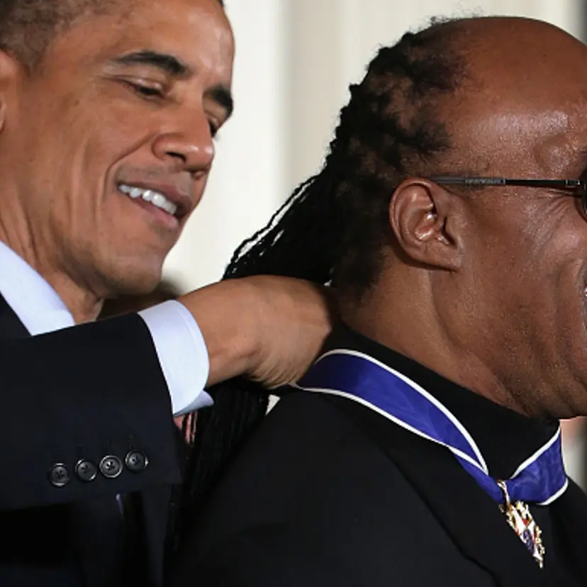 U.S. President Barack Obama (L) presents the Presidential Medal of Freedom to singer songwriter Stevie Wonder (R) during an East Room ceremony at the White House November 24, 2014 in Washington, DC.