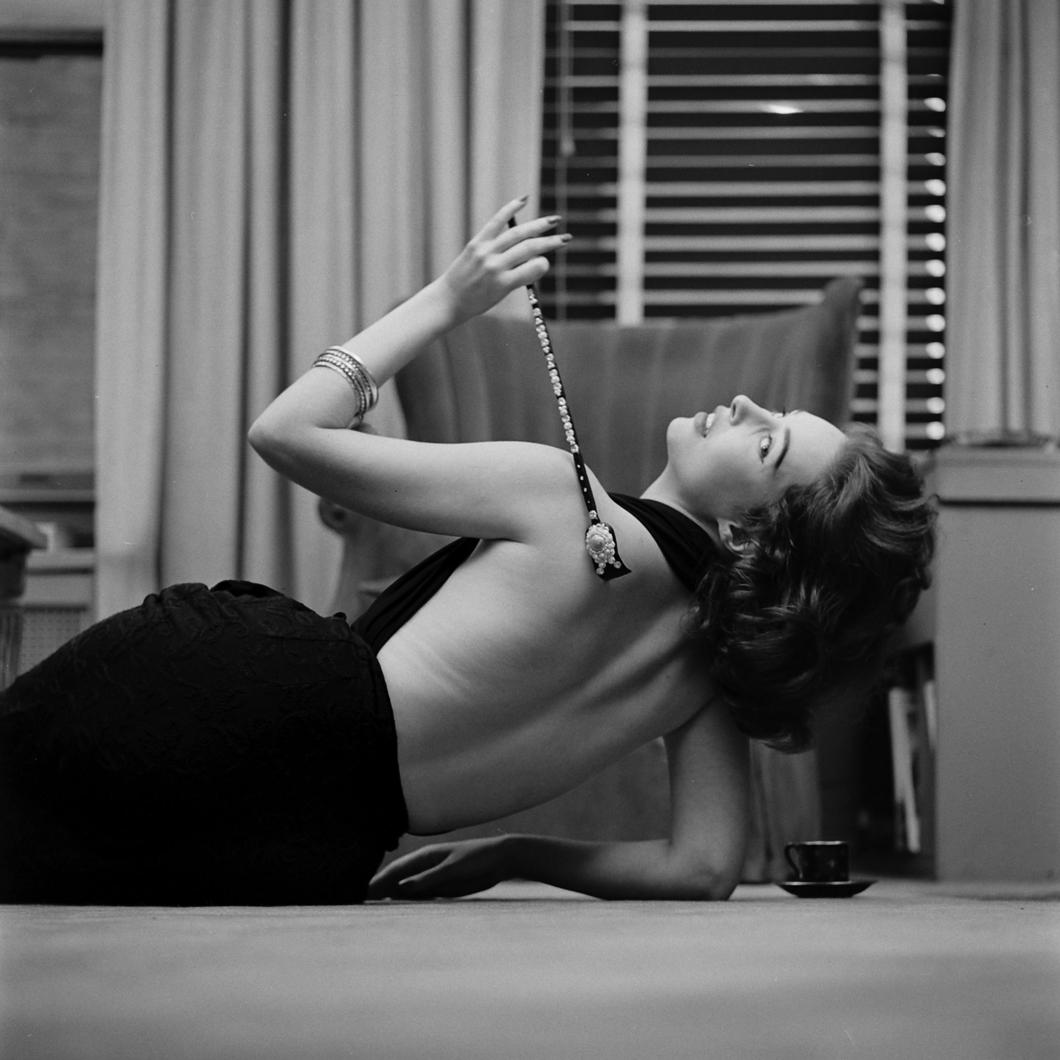 A back-scratcher encrusted with gilt, pearls and sea shells is an expensive adaptation of a standard 39-cent model.