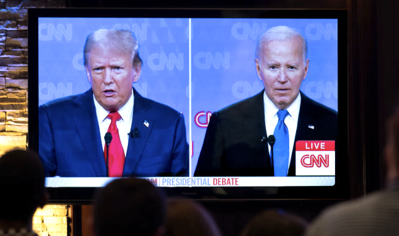 President Joe Biden and presumptive Republican nominee former President Donald Trump battled it out during the first presidential debate on June 27, 2024. Pictured here is a viewing of the debate in Chicago, Illinois. 
