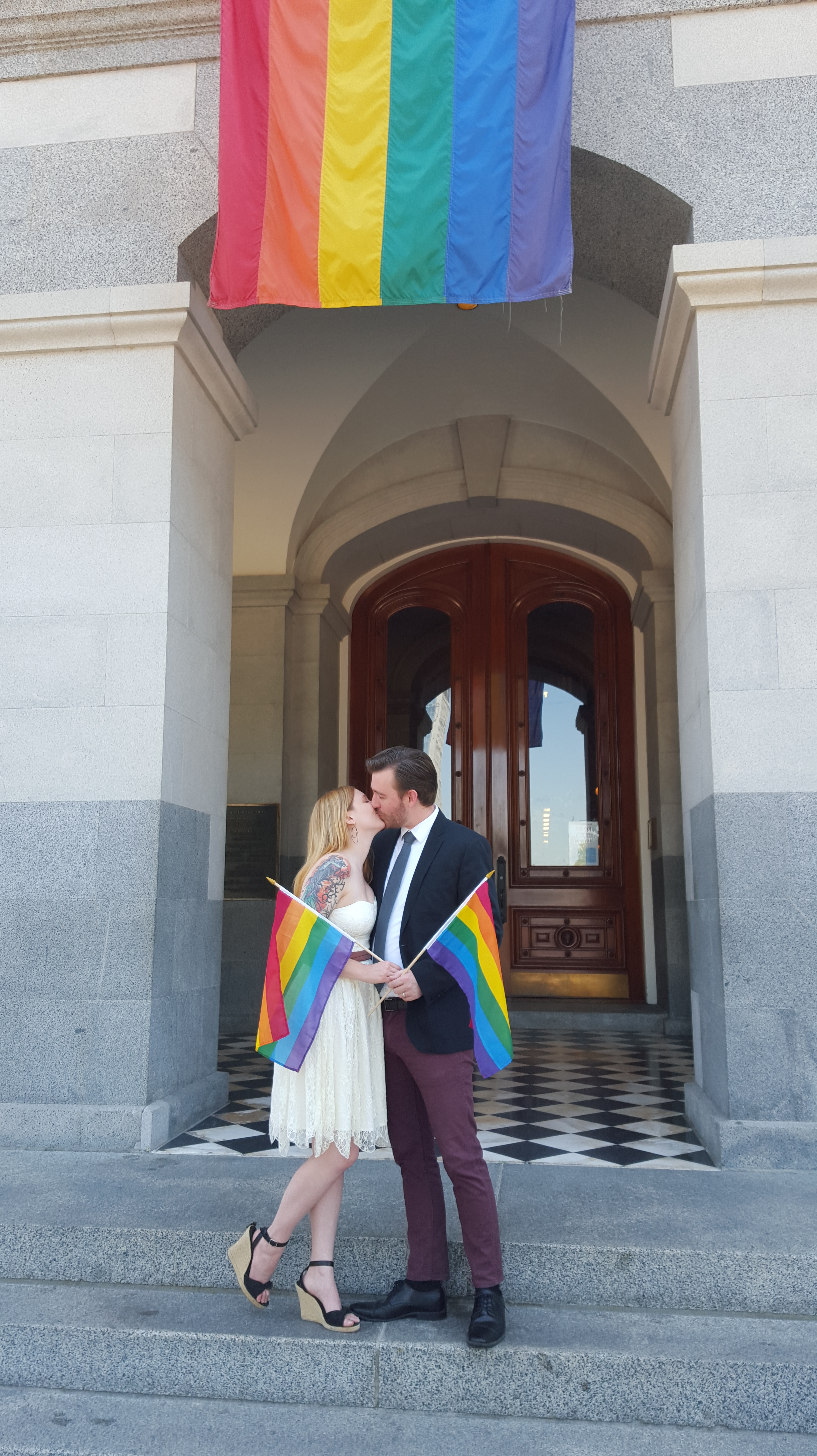 Roxy and Jordan Davis pose for pictures at the California State Capitol building in Sacramento after getting married at the County Clerk/Recorder's Office on June 26, 2015.