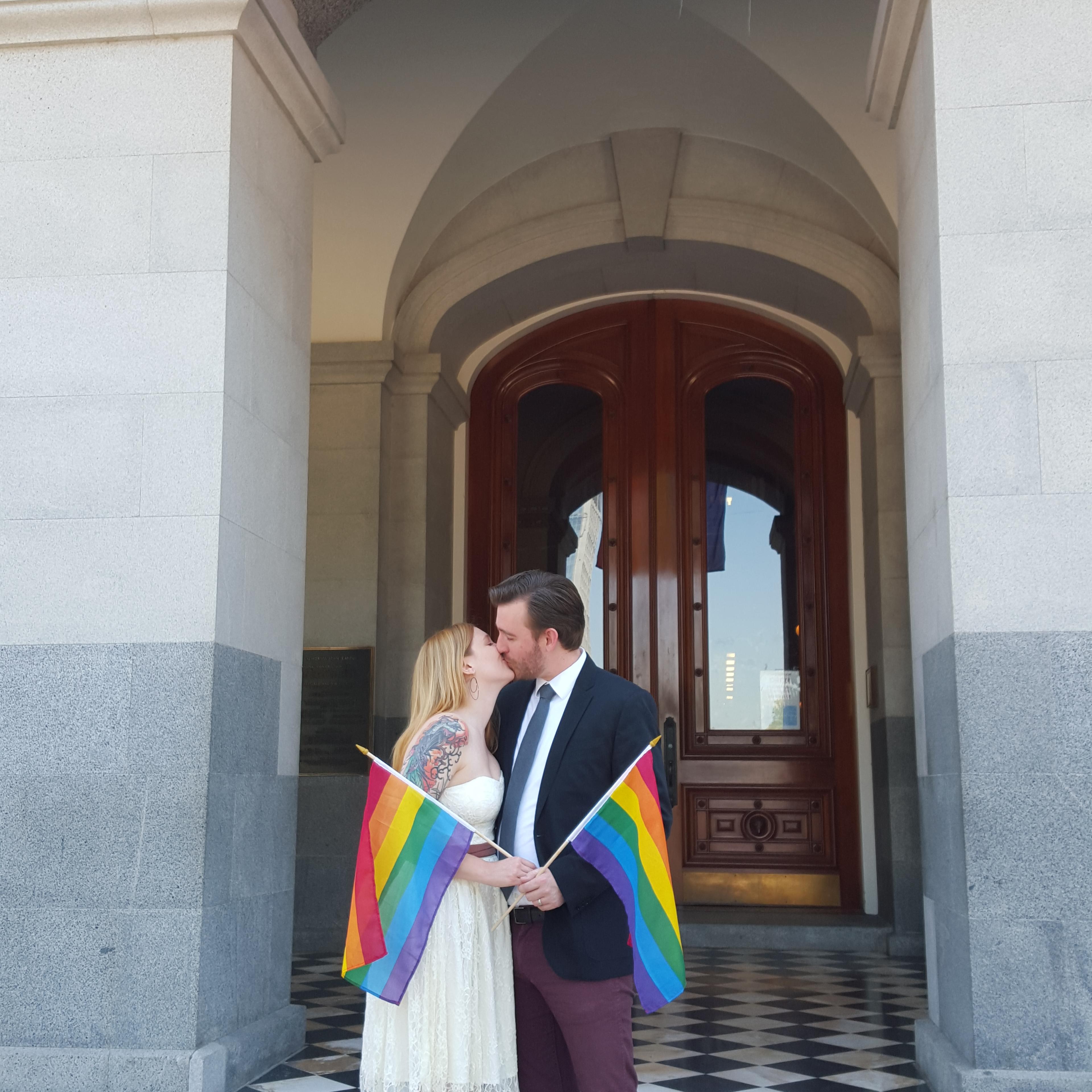 Roxy and Jordan Davis pose for pictures at the California State Capitol building in Sacramento after getting married at the County Clerk/Recorder's Office on June 26, 2015.