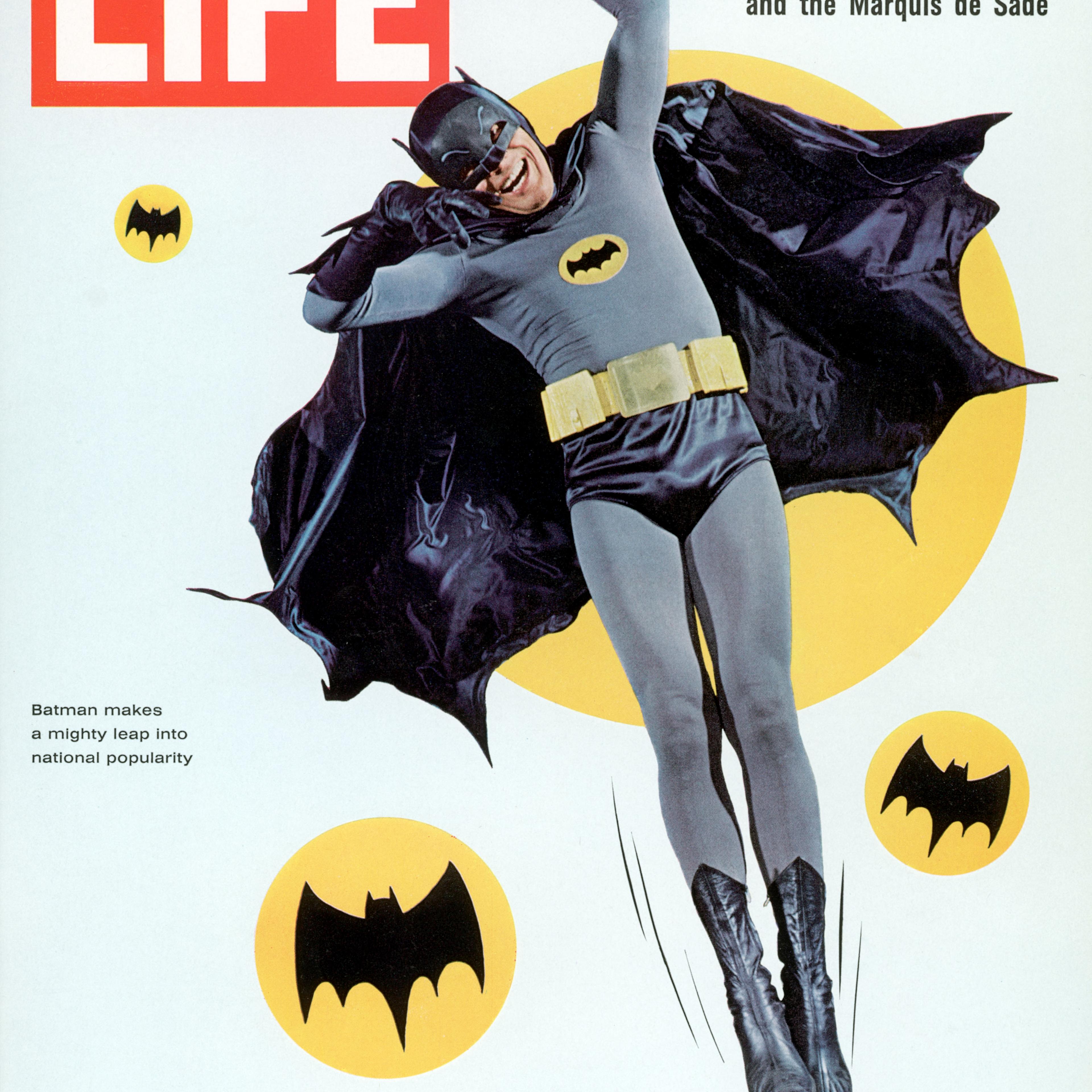 Adam West strikes a hammy pose as superhero Batman in 1966.
