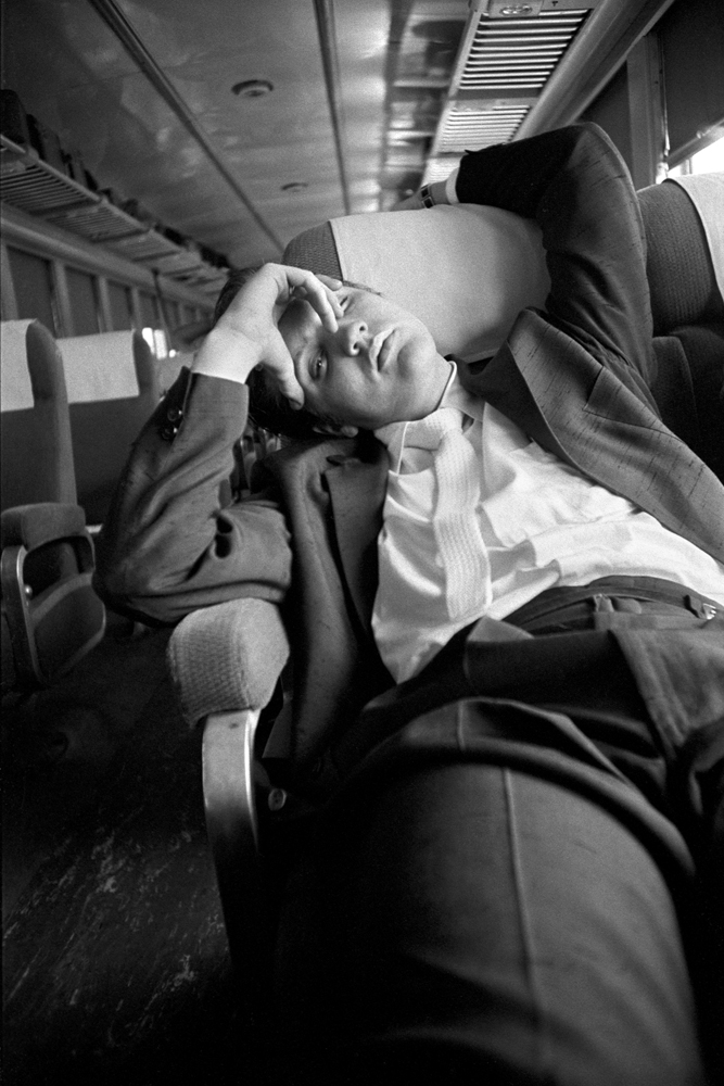 July 4, 1956. Asleep on the the train journey back home to Memphis. I call this One Eyed Jack. It reminds me of Walter Huston in the film 'The Treasure of Sierra Madre' — the tale of three distrusting prospectors in Mexico — in which he sleeps with one eye open and then the other closed. You don't know it at the time, but the character he plays is blind in one eye. 